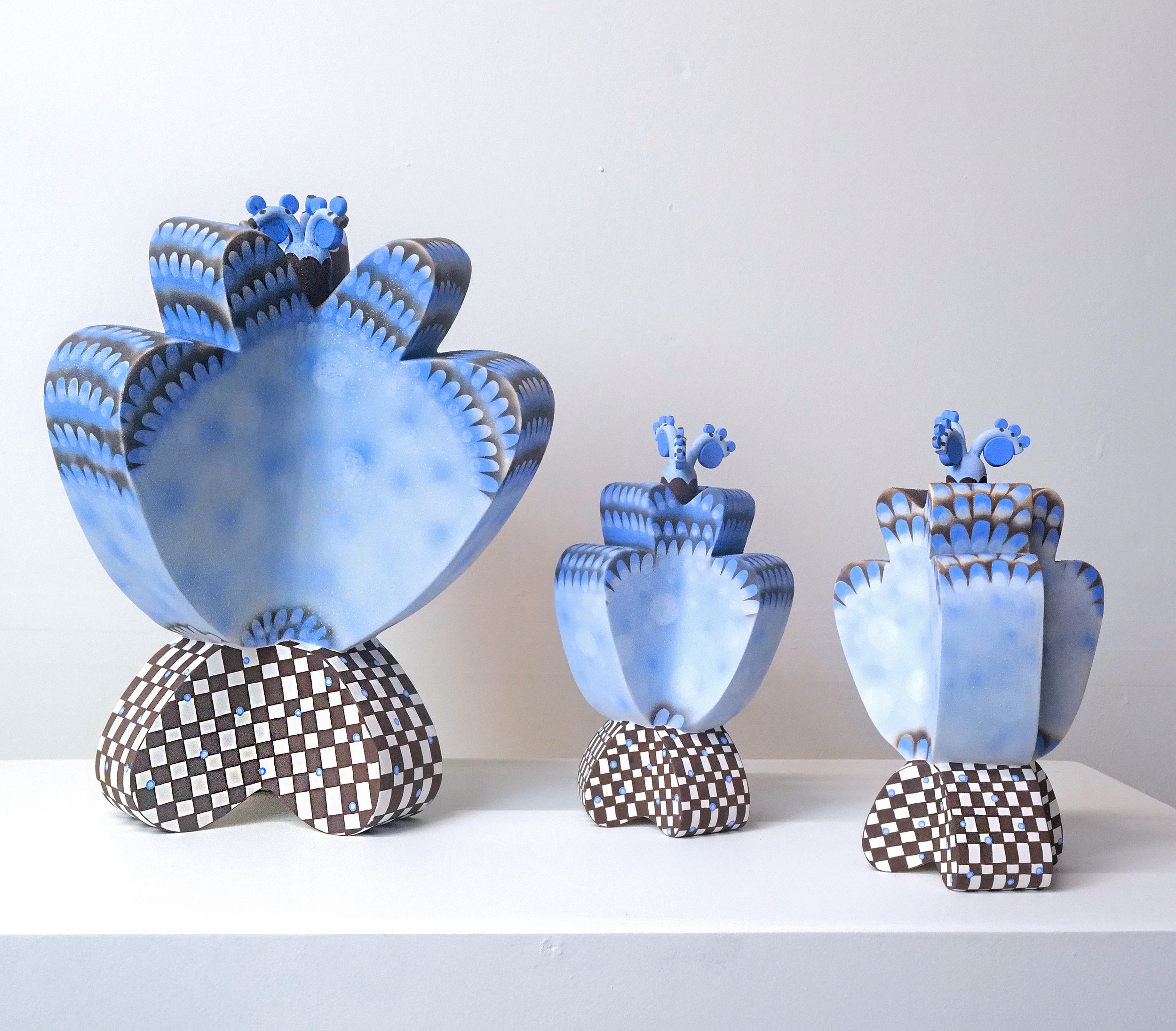 blue and brown decorative ceramic flower plant sculpture