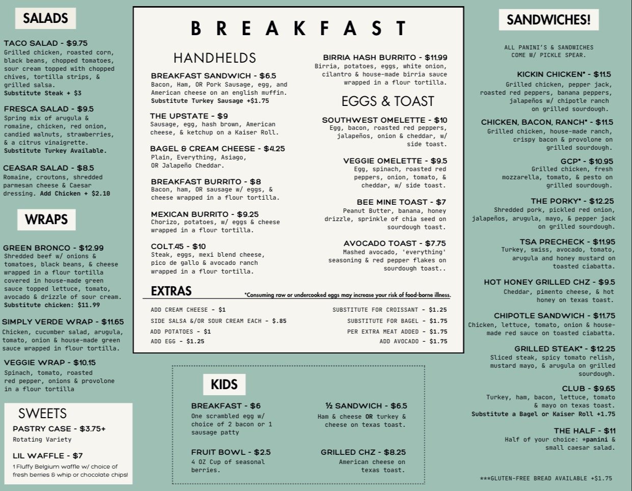 Menu featuring breakfast options, salads, wraps, sandwiches, eggs, toast, extras, kids' meals, sweets, with prices and descriptions.