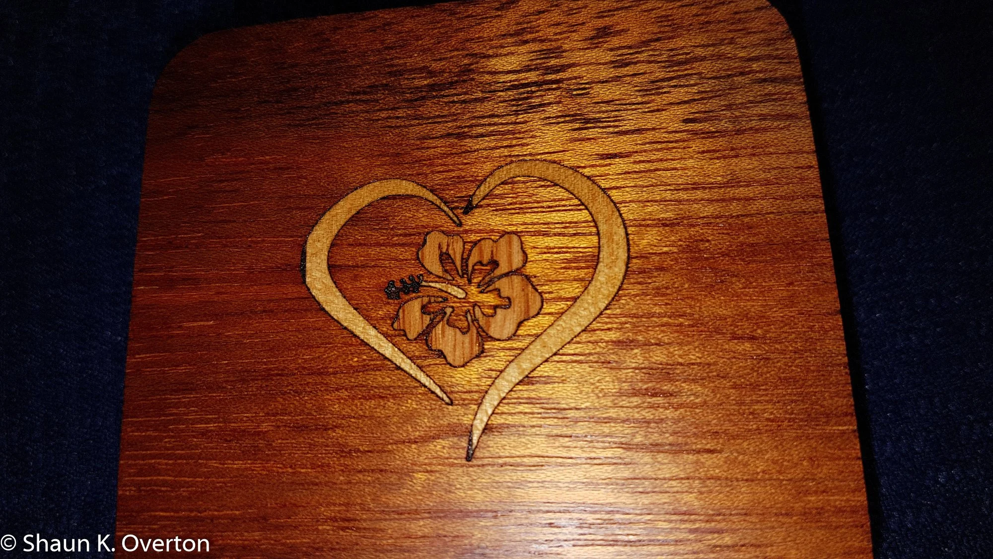 Crafted mahogany box lid with birch and oak veneer inlay.