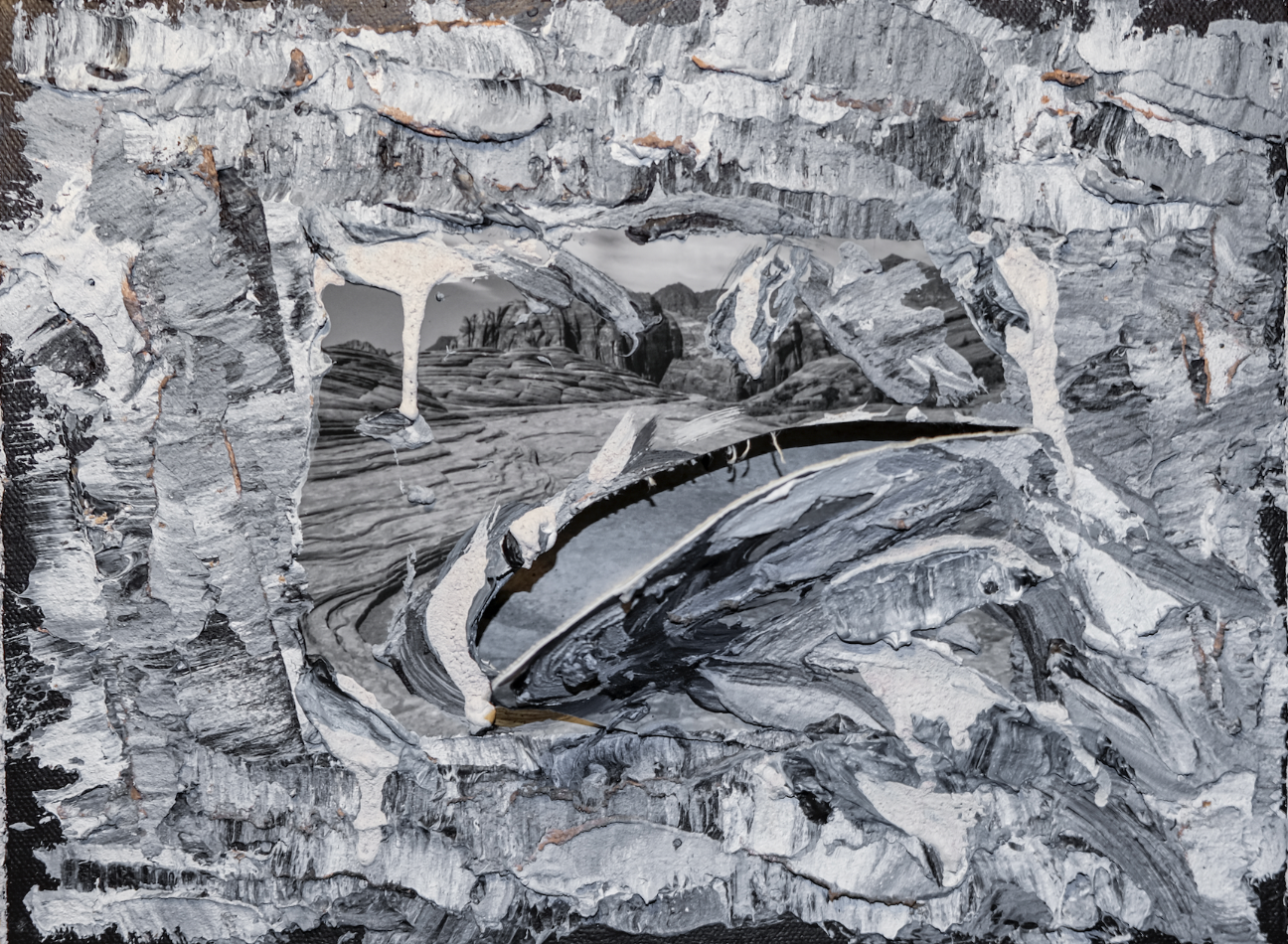 A black and white mixed media artwork depicting a surreal landscape with abstract elements, textures, and layered paper or paint strokes.