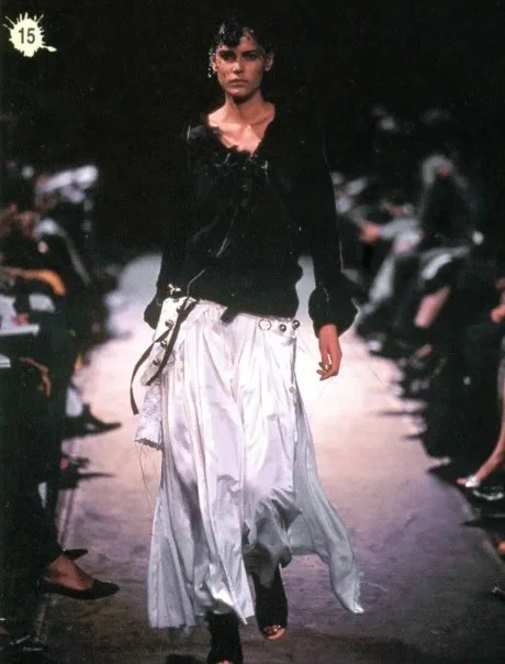 UNDERCOVER SCAB (SS03)
More wound than garment. Jun Takahashi&rsquo;s SCAB collection arrived in Paris in 2003 looking less like luxury fashion and more like something excavated from underground youth culture, patched fabrics, visible repairs, distre
