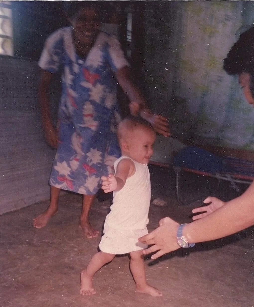 Grandma teaching me to walk.