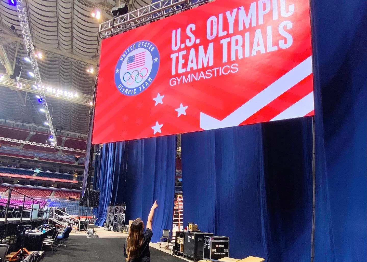USA Gymnastics staff photographer Allison Mott capturing action shots on the competition floor at the 2021 US Olympic Gymnastics Trials in St. Louis.
