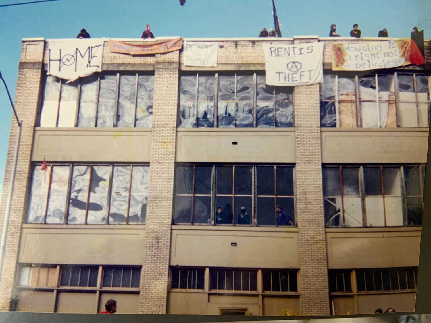 mass public squat at the Battle of Seattle.jpeg