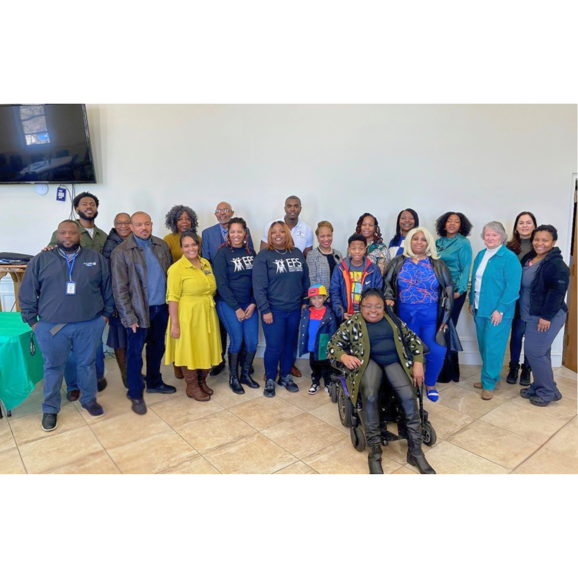 Community leaders and partners gathered during the Up Giving Village Build Bridges event with Eastchester Family Services and Douglasville Mayor Rochelle Robinson.