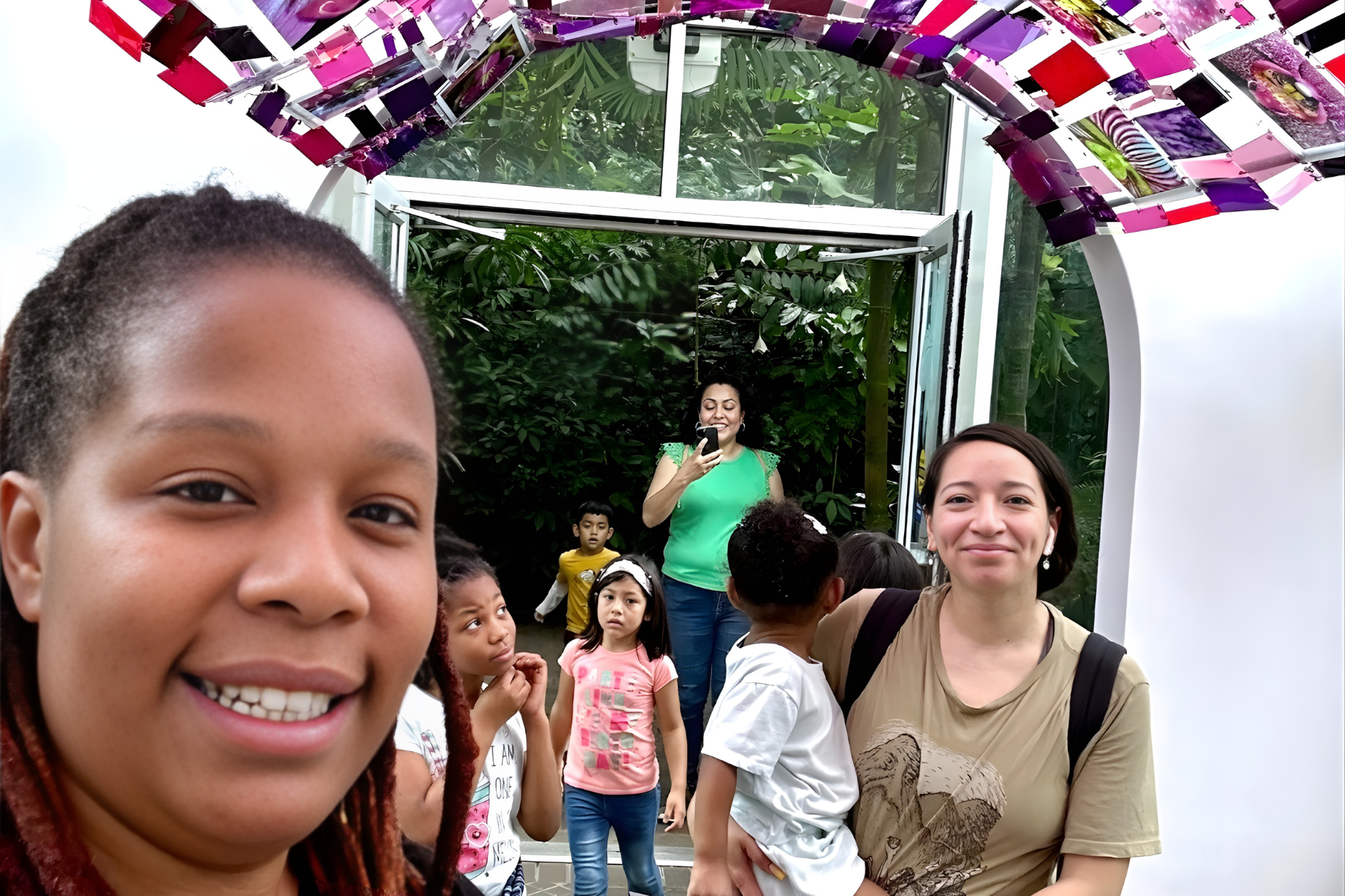 Families and children participating in an inclusive outdoor community experience through Stepping Out.