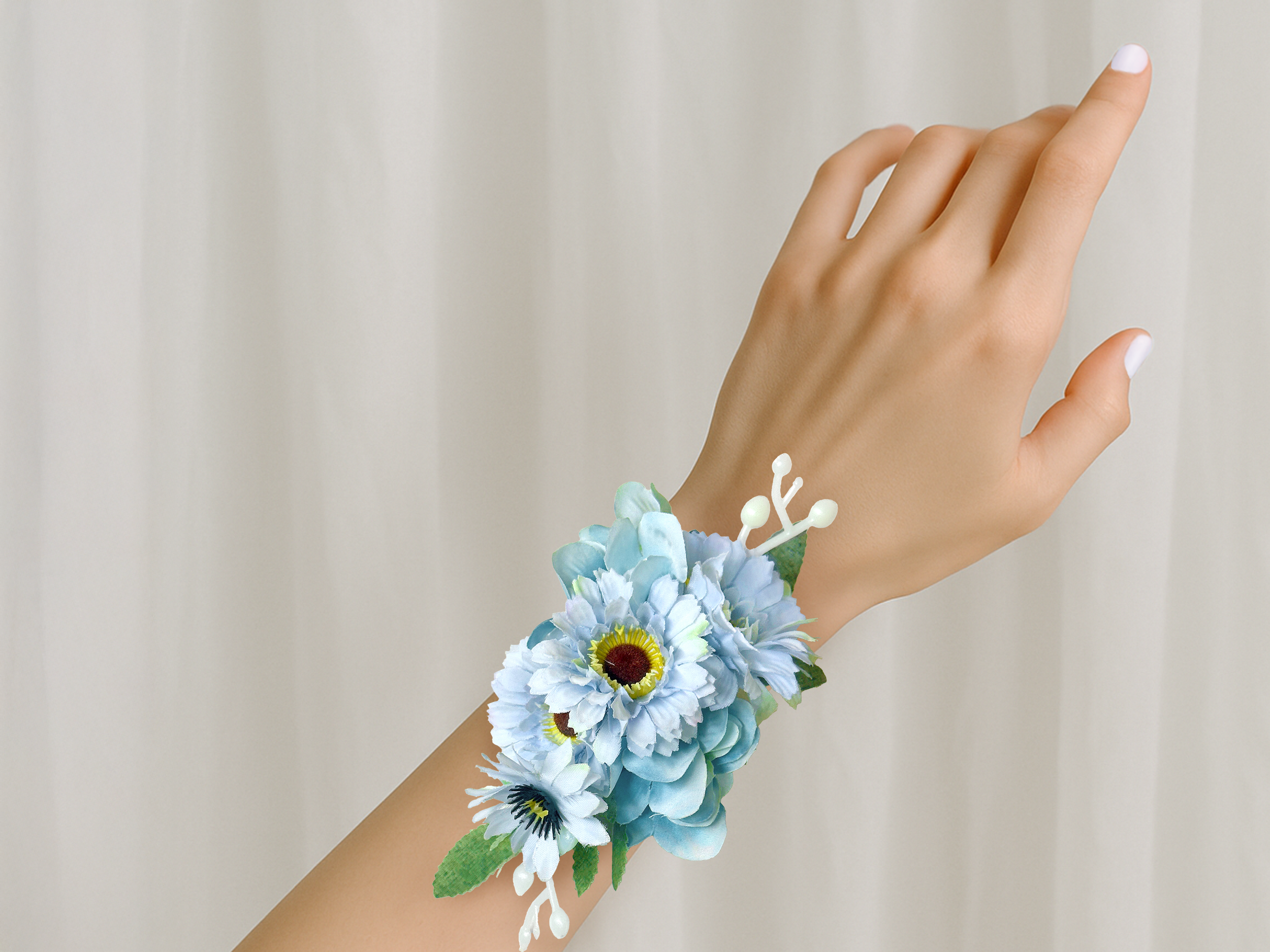 Light blue corsage on wrist.png