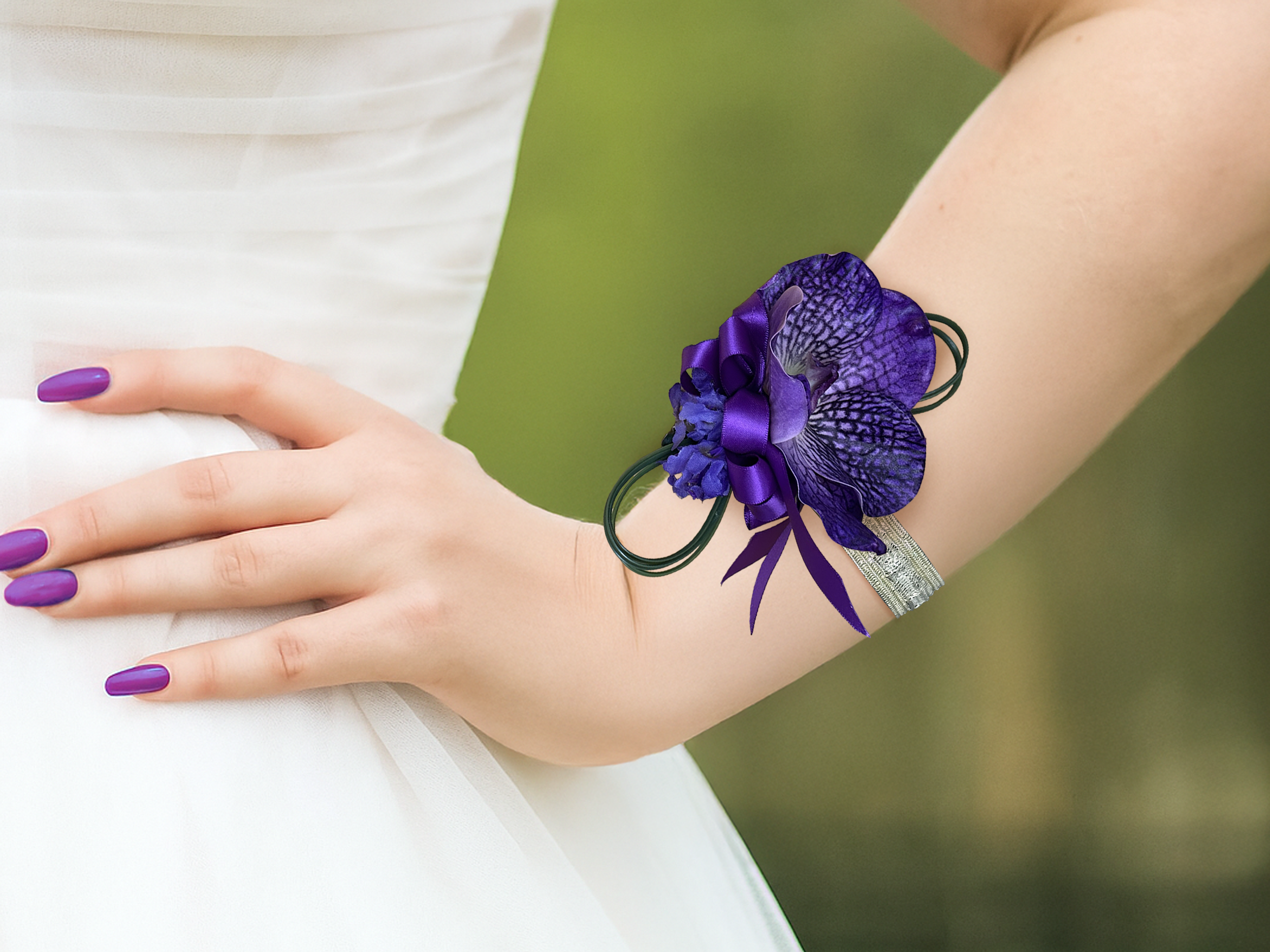 Purple Vanda Orchid corsage on wrist outside.png