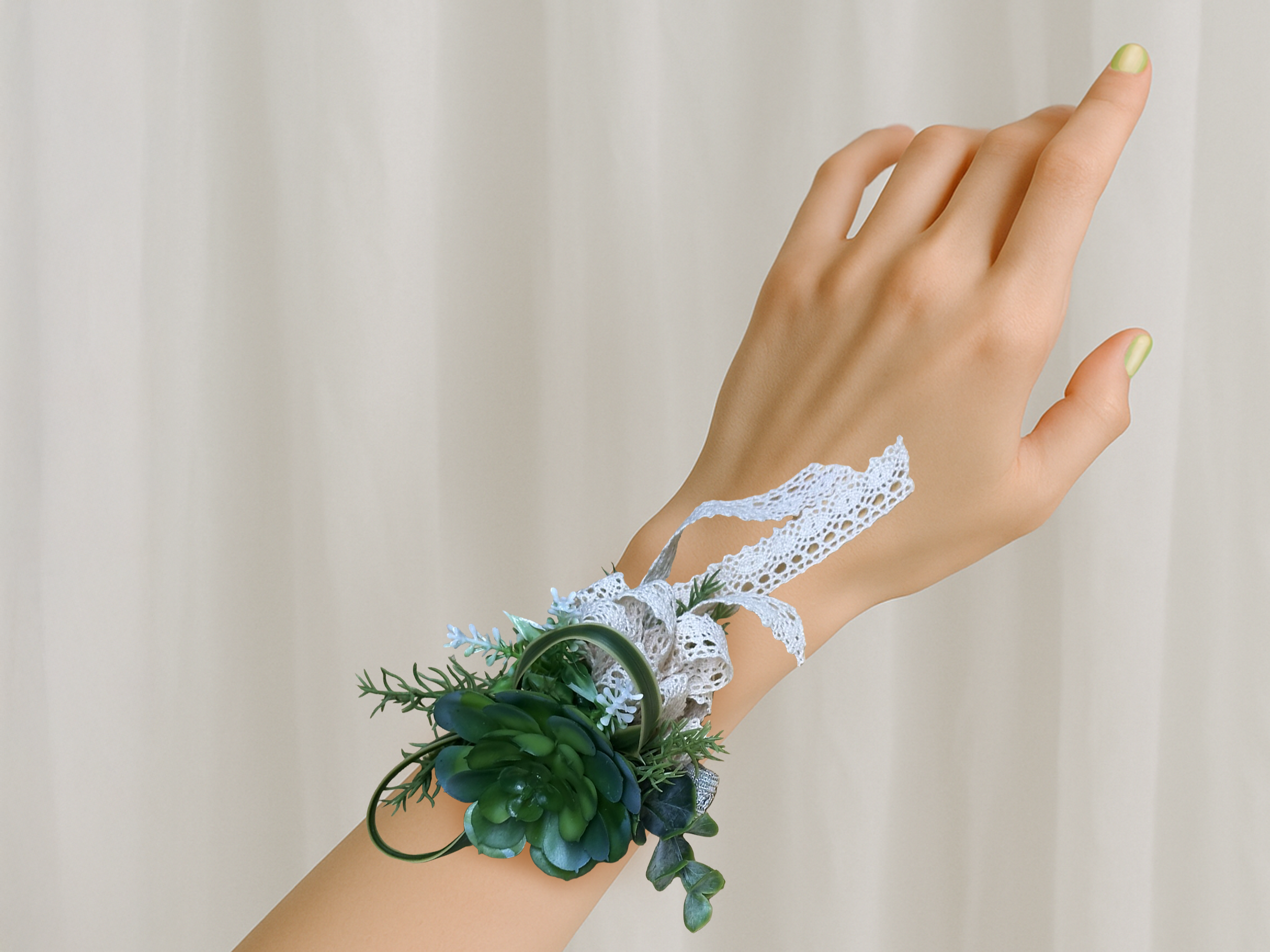 succulent corsage on wrist.png