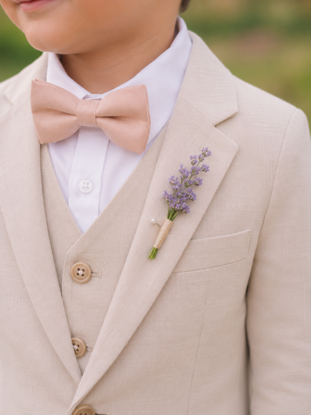 Pastel Petal Garden Page Boy Boutonniere