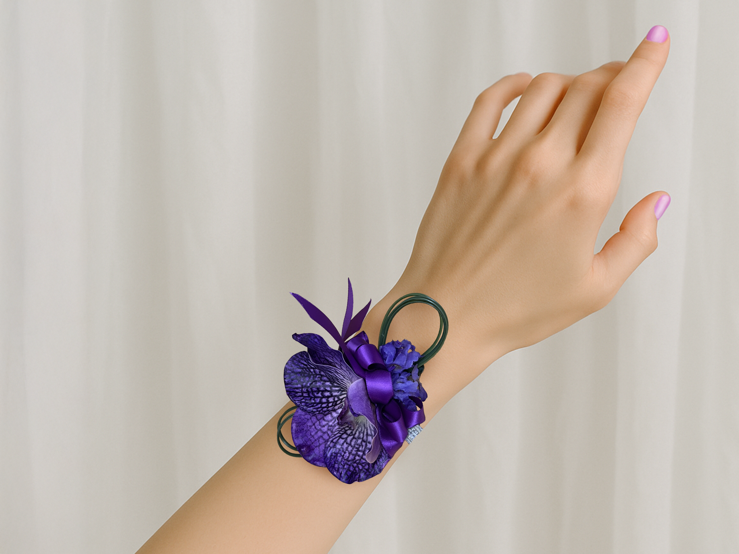 Purple Vanda Orchid corsage on wrist.png