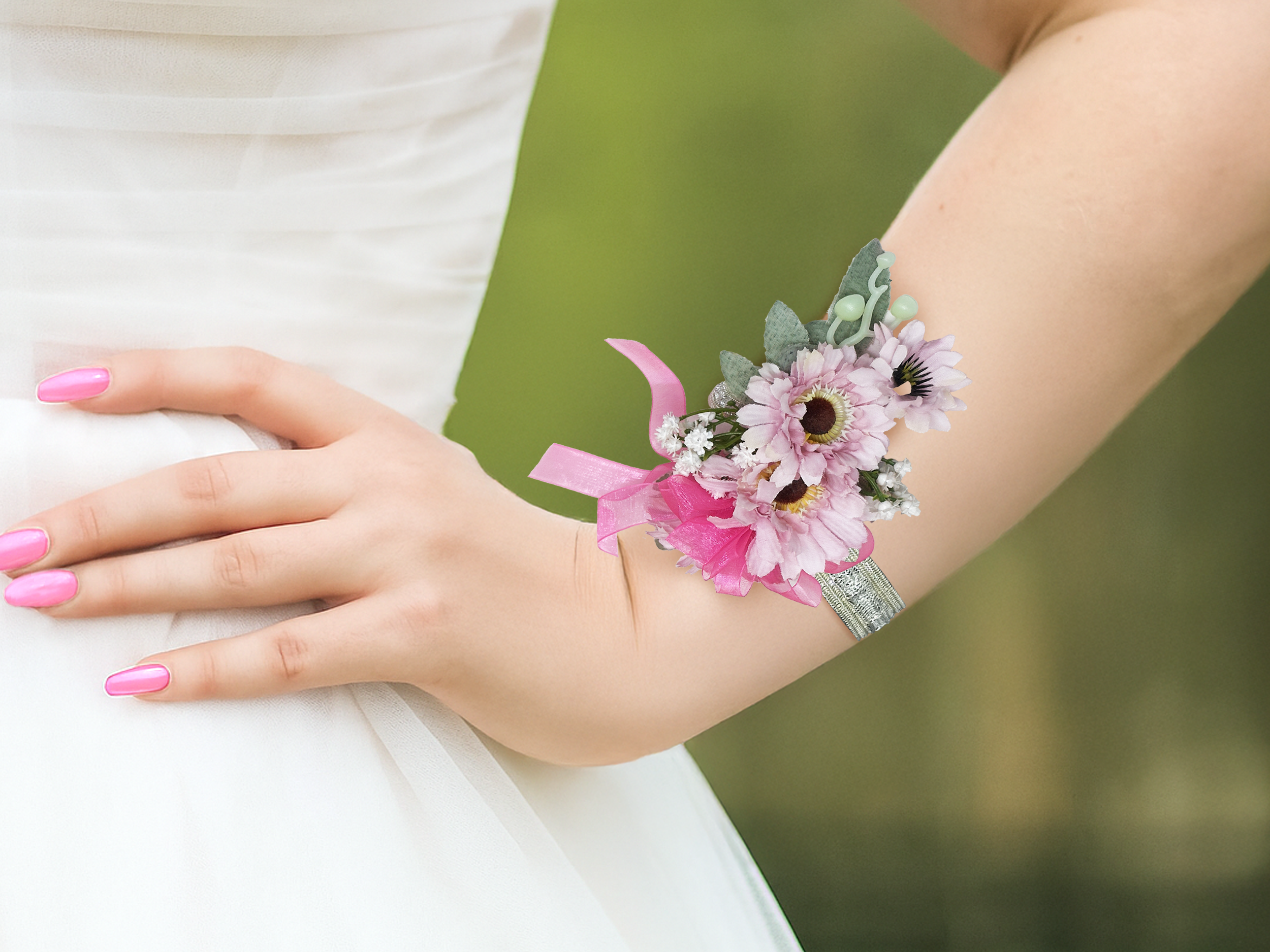 Pink 2 corsage on wrist outside.png