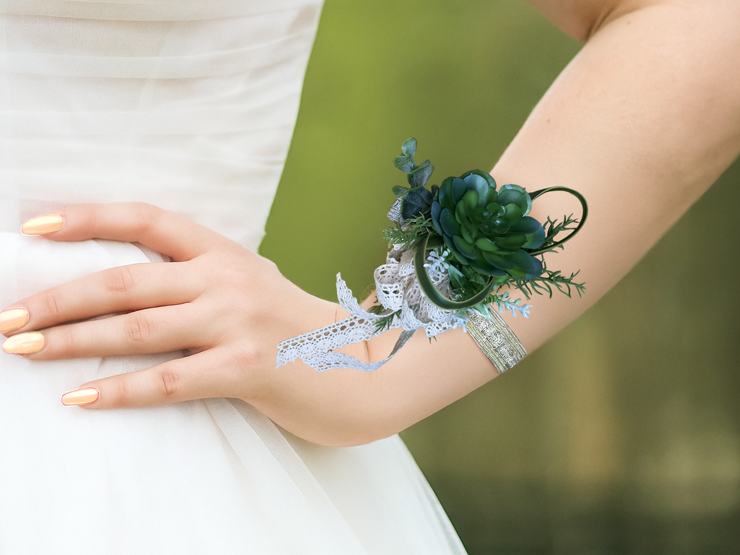 Succulent corsage on wrist outside.png