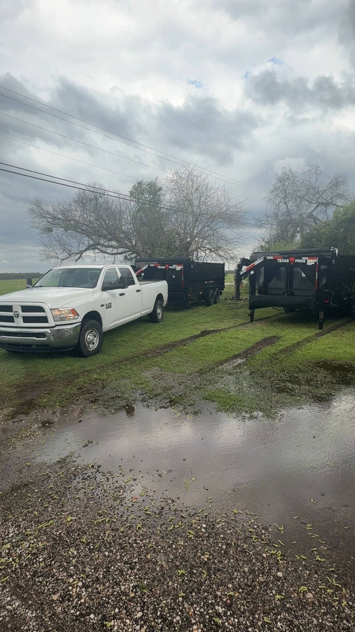 Two 16yd dumpster trailers