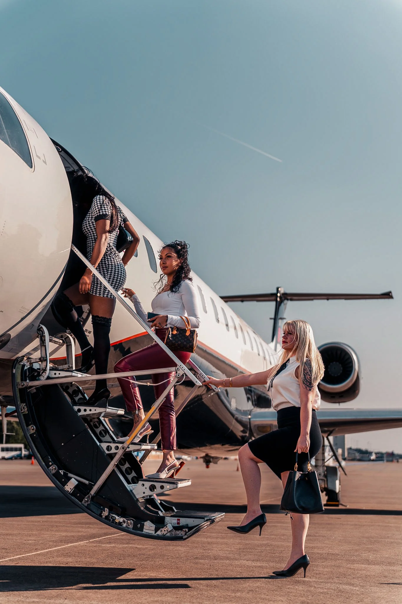 Passengers boarding an Exodus Aircraft private jet, showcasing a seamless and elevated luxury travel experience