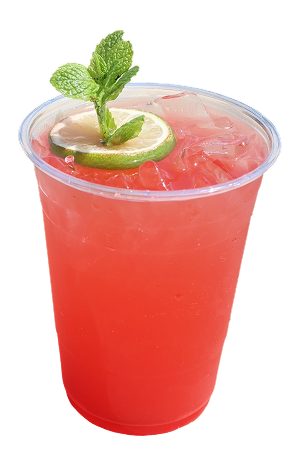 Pinkish-red cocktail with ice, garnished with a lime slice and a mint sprig.