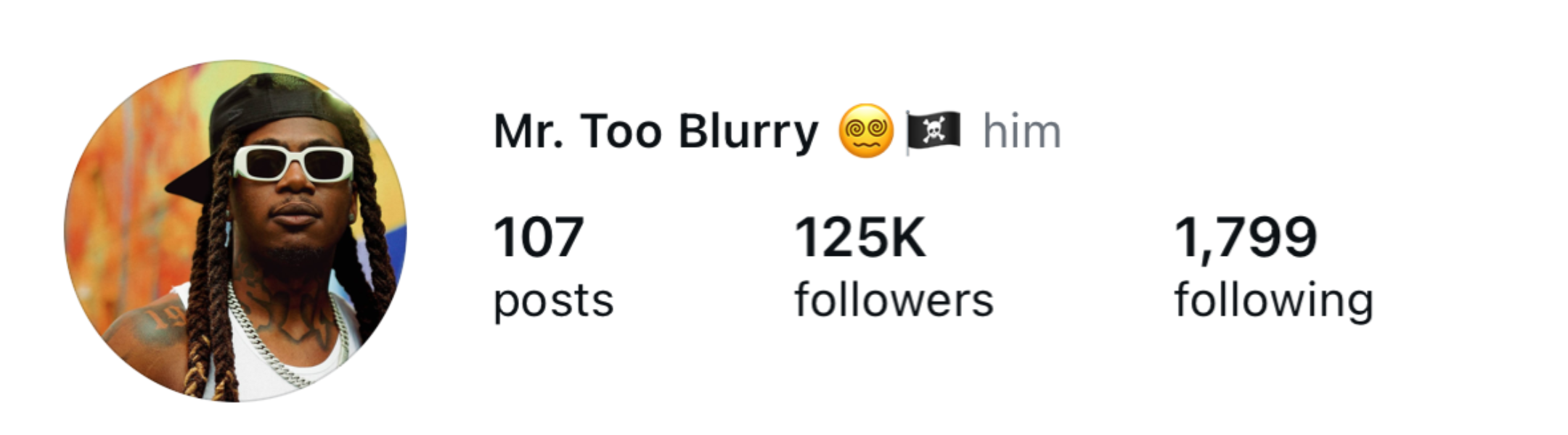 Social media profile of Mr. Too Blurry, a man wearing sunglasses, a black cap, and chains, with 107 posts, 125K followers, and 1,799 following.