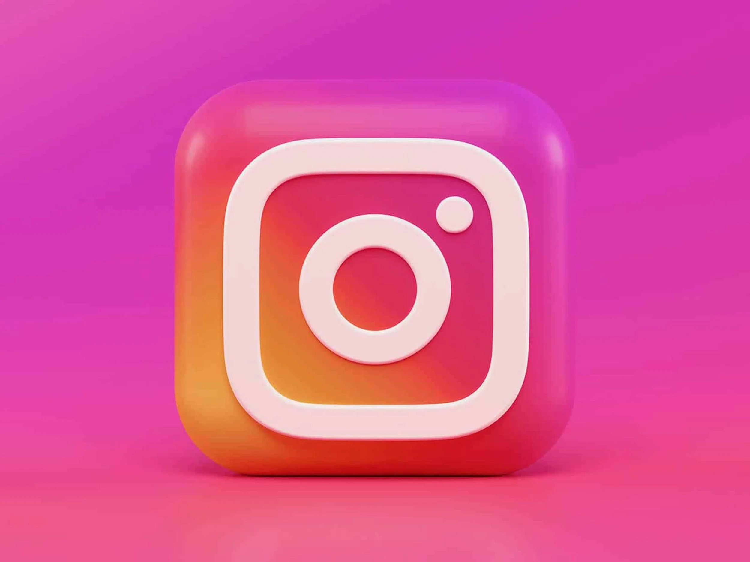 3D illustration of the Instagram logo with a gradient background in pink, orange, and purple hues.