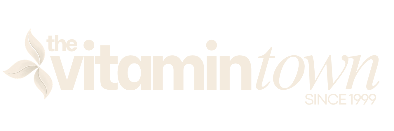 The Vitamintown logo with the words 'the vitamintown since 1999' and a stylized leaf design.