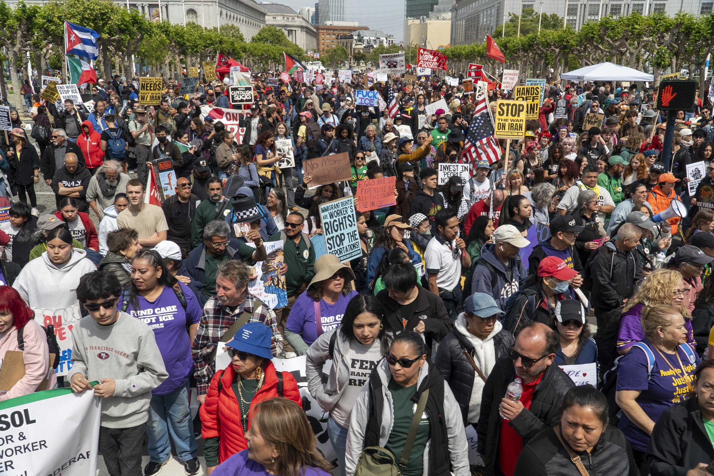  Approximately 1,500 people gather at Civic Center Plaza for the May Day rally, demanding better workers’ rights, higher taxes on billionaires, and an end to the Trump administration's cuts to healthcare, education, and food assistance. (Neal Wong / 