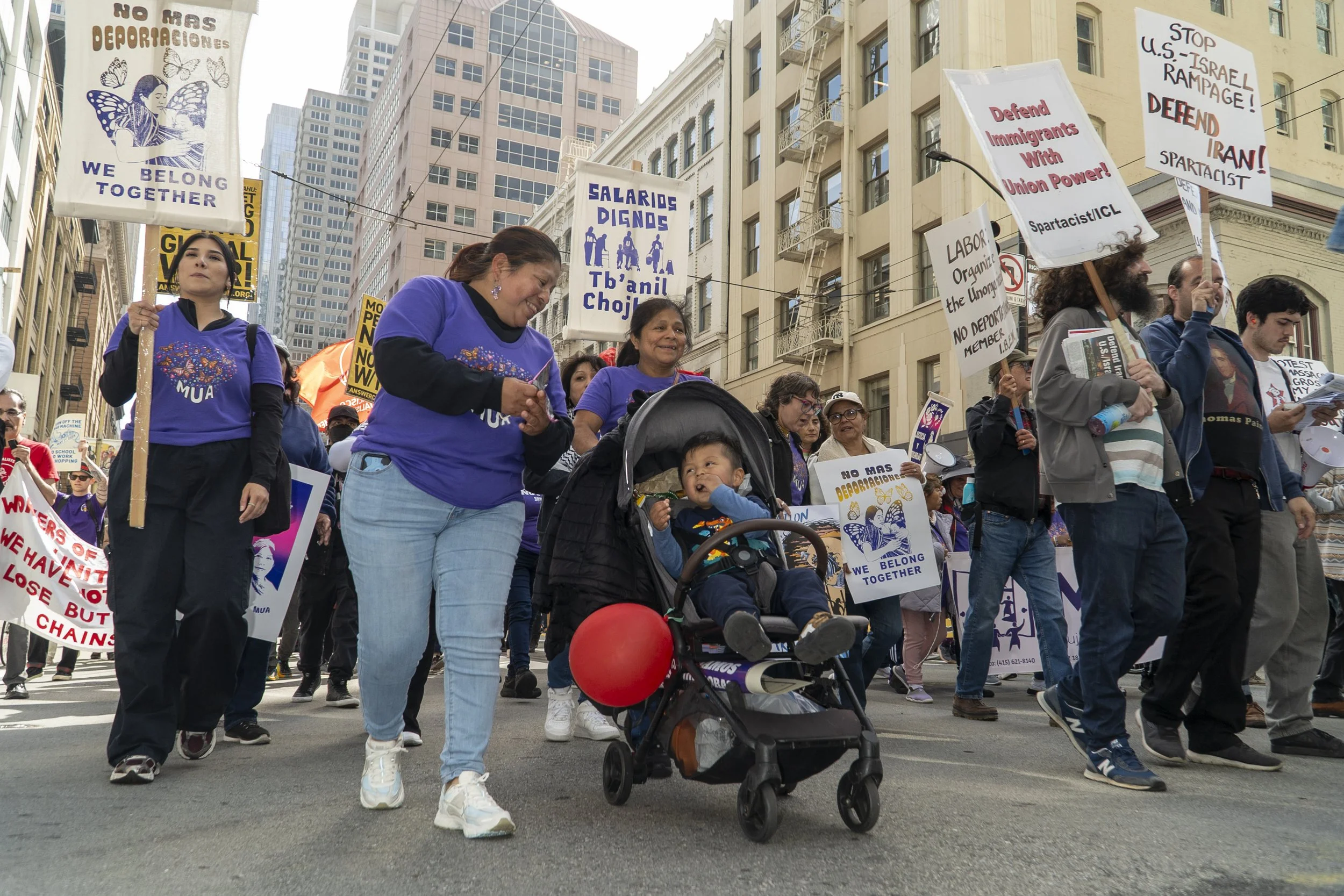  Thousands march down Mission Street toward Embarcadero Plaza during May Day demonstrations calling for workers’ rights, a statewide billionaire tax, and resistance to the Trump administration’s actions against working people. (Neal Wong / San Franci