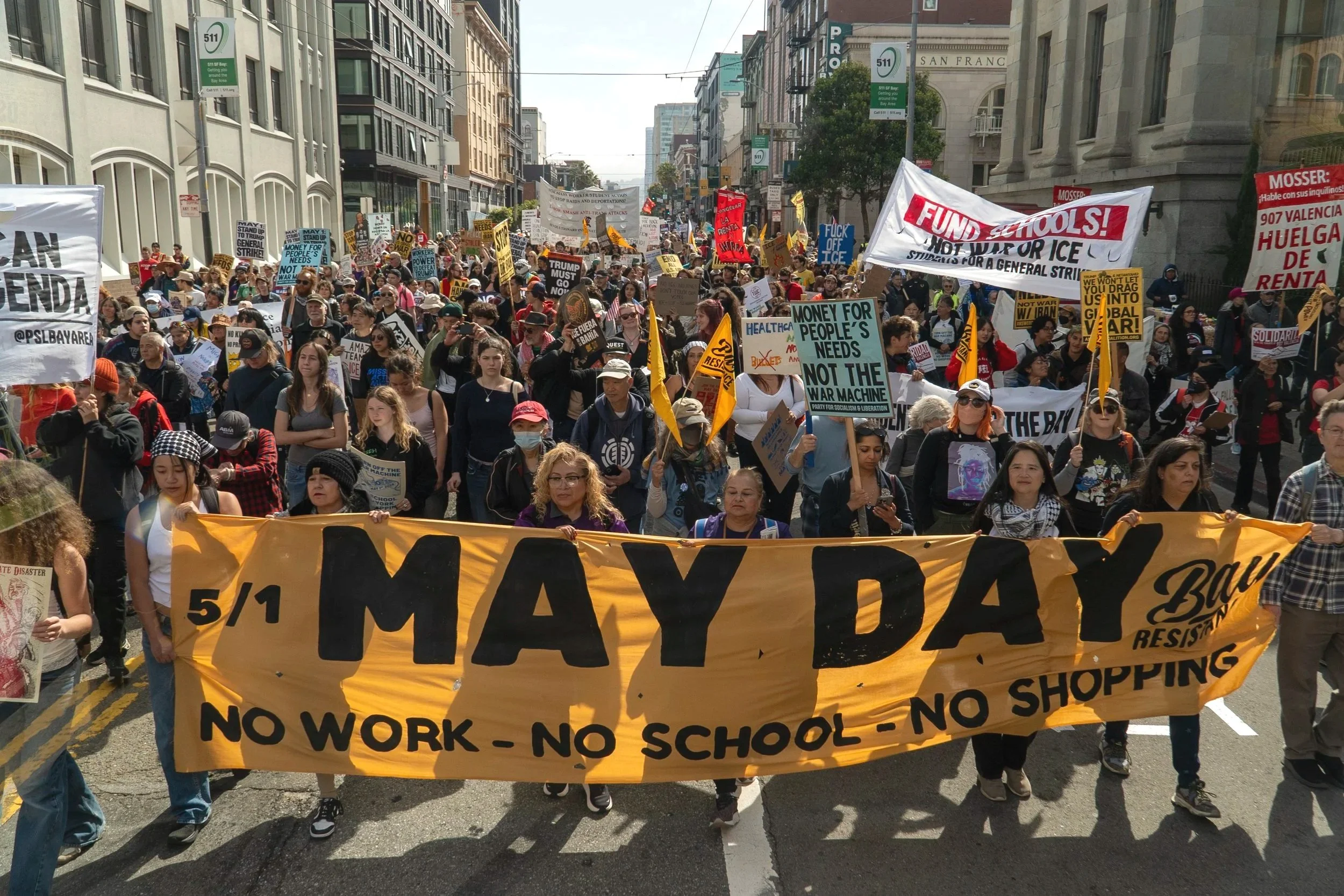  Thousands of protesters make their way to Mission Street following the Civic Center Plaza rally, marching against billionaire greed and the Trump administration’s cuts to the programs working people depend on. (Neal Wong / San Francisco Public Press