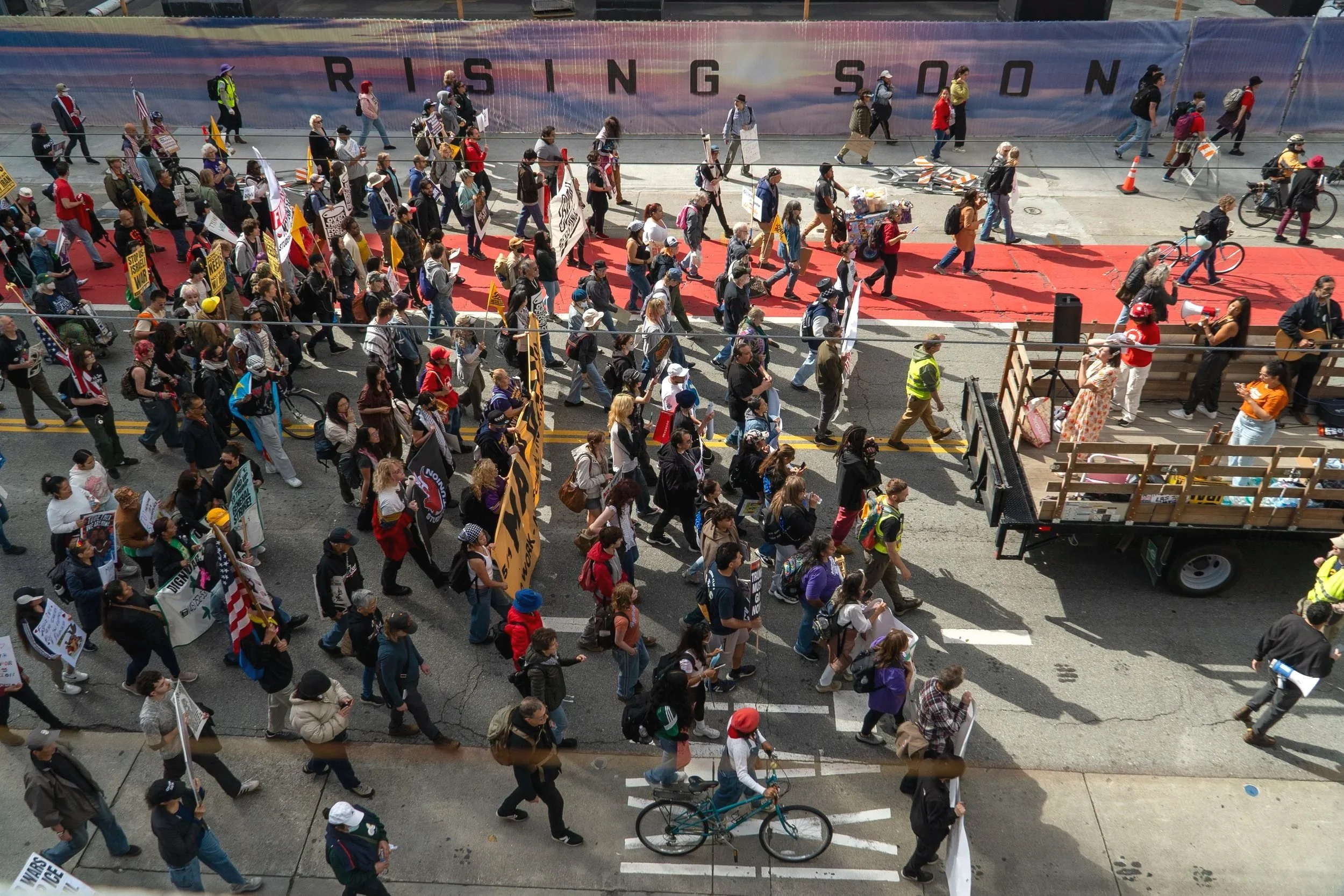  Thousands march down Mission Street toward Embarcadero Plaza during May Day demonstrations calling for workers’ rights, a statewide billionaire tax, and resistance to the Trump administration’s actions against working people. (Neal Wong / San Franci