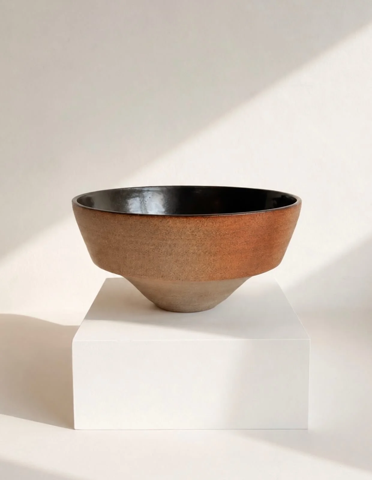 A sculptural serving bowl, wheel-thrown in grey clay with a matt black glazed interior. 22 cm W &times; 11 cm H.

I&rsquo;ll be bringing this, along with a small selection of sculptural and functional ceramics, to the Art and Design Market at Abney H