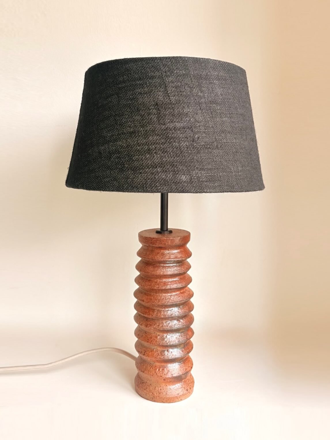 Stoneware Table Lamp

Thrown on the wheel and wood fired @oxfordkilns in January. Fired unglazed at the front of the fast-fire kiln, where the travelling ash settled onto the surface, leaving an unexpected metallic finish.

Finally got around to gett