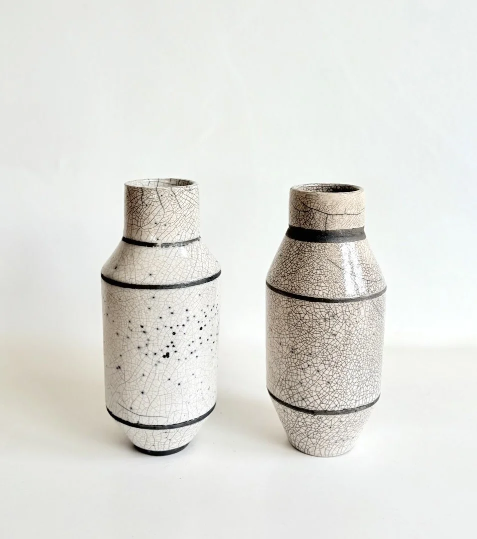 Raku Twin Vases - white crackled glaze
contrasted with unglazed sections of blackened raw clay