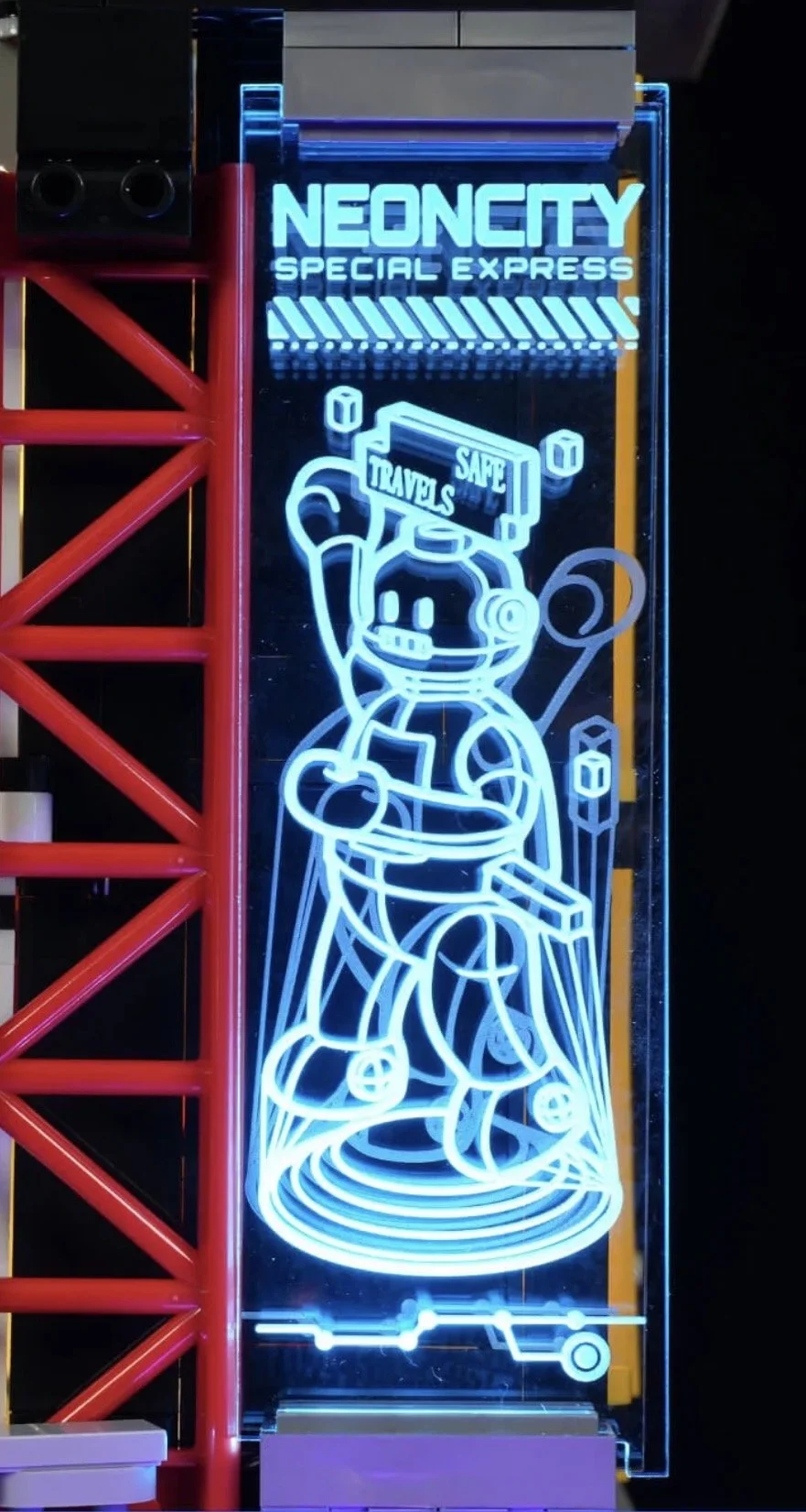Panneau lumineux en néon avec un robot stylisé tenant une pancarte 'Travel's Sape'. Texte en haut : 'Neon City Special Express'.