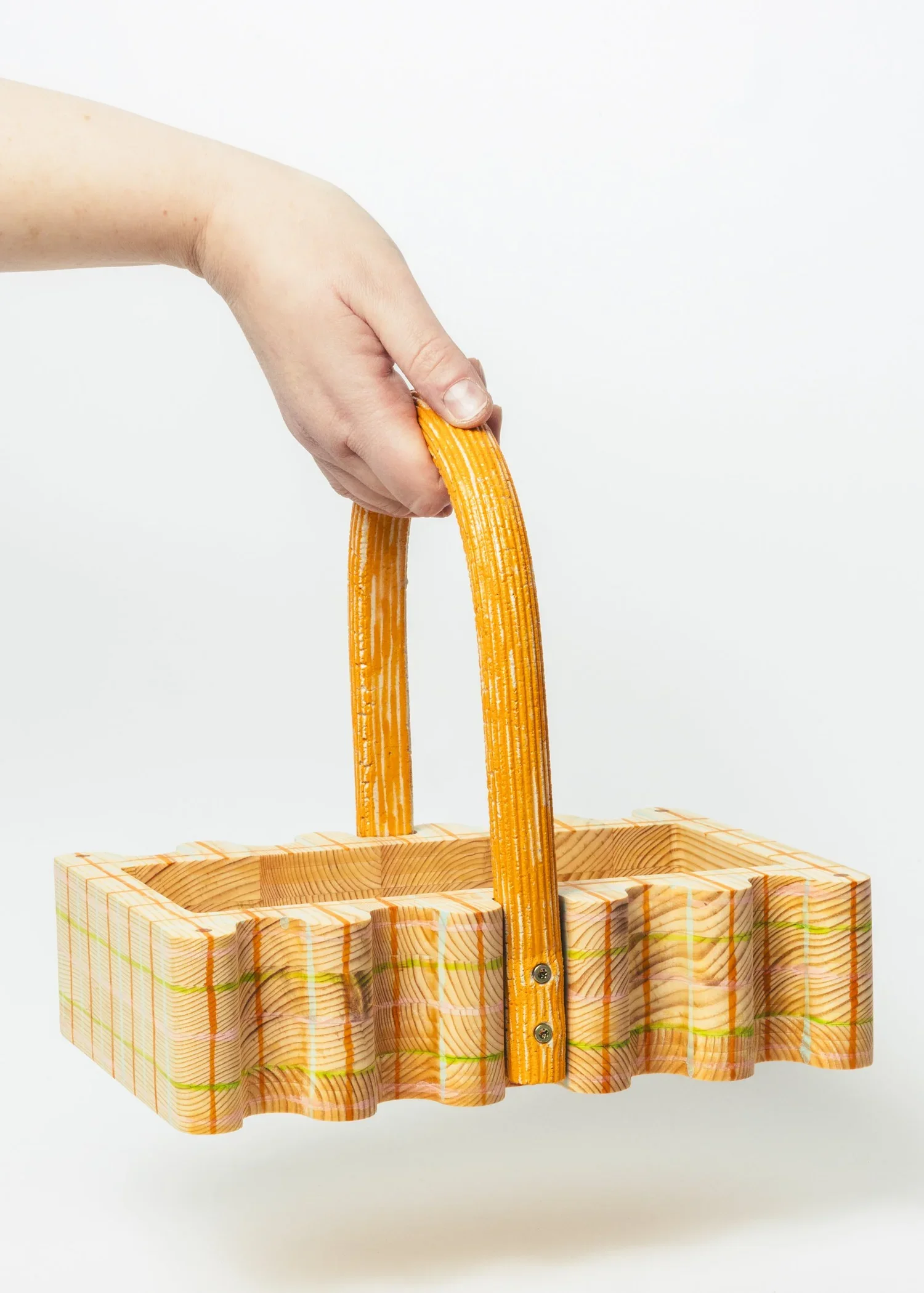 Wood+basket+with+hand_photo+by+Sunna+Ben.webp