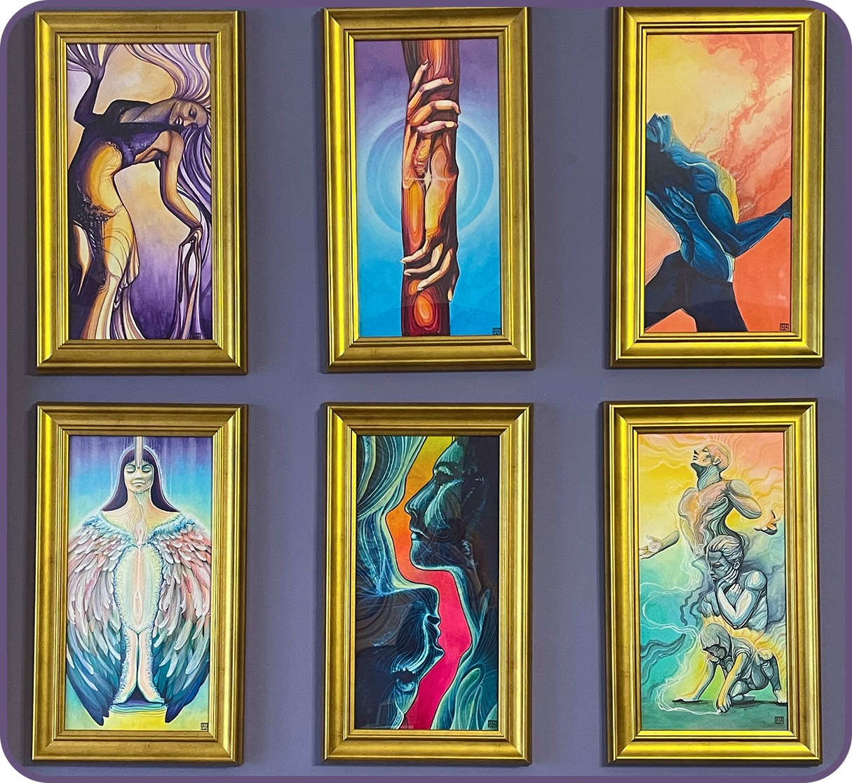 Six framed abstract and surreal paintings on a purple wall, each depicting different human-like figures and faces with vibrant and swirling colors. paintings done by annai anima at Tatuarium tattoo studio in Vienna, Austria