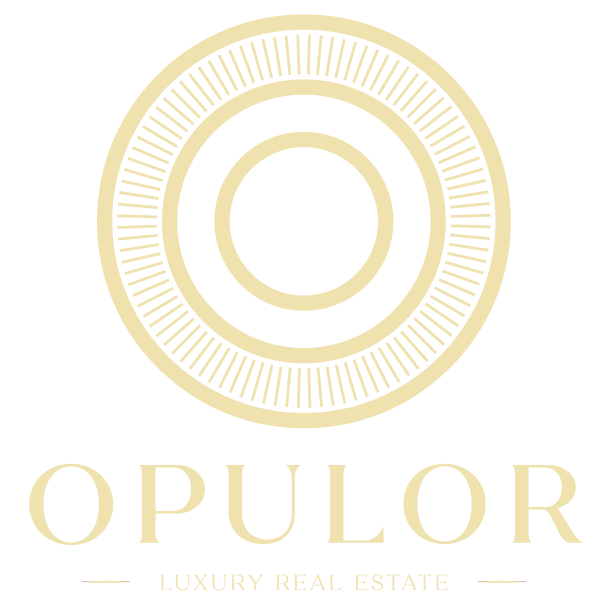 Opulor logo with circular design and the text "Opulor Luxury Real Estate" beneath it.