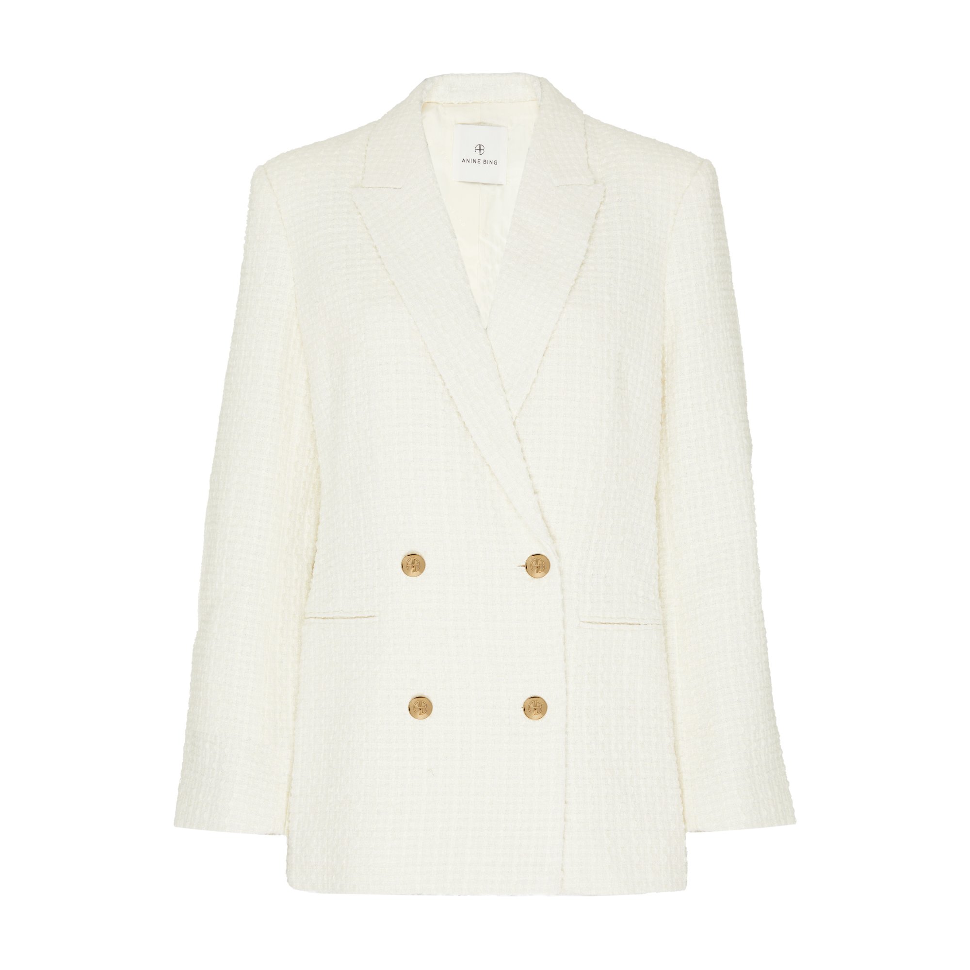 Veste blanche à double boutonnage avec quatre boutons dorés et une texture en tweed, sans manches, avec col à revers