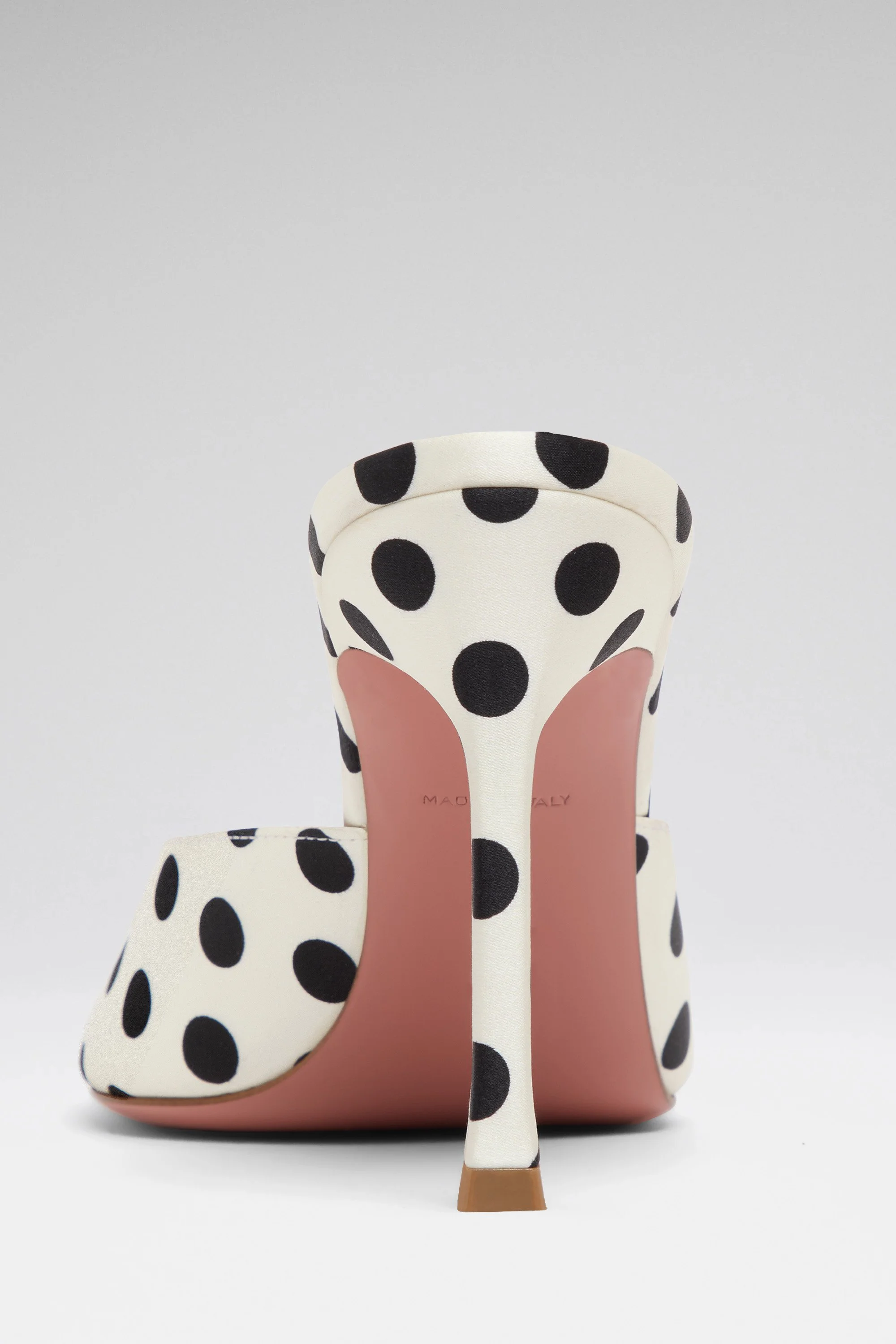 Chaussure à talon haut avec motif à pois noir et blanc et intérieur rose