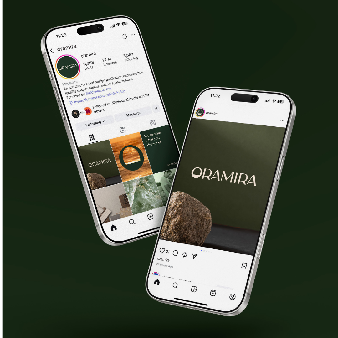 Two smartphones displaying social media profiles for ORAMIRA, an architecture and design publication, with a brown rock in front of the screens against a dark green background.