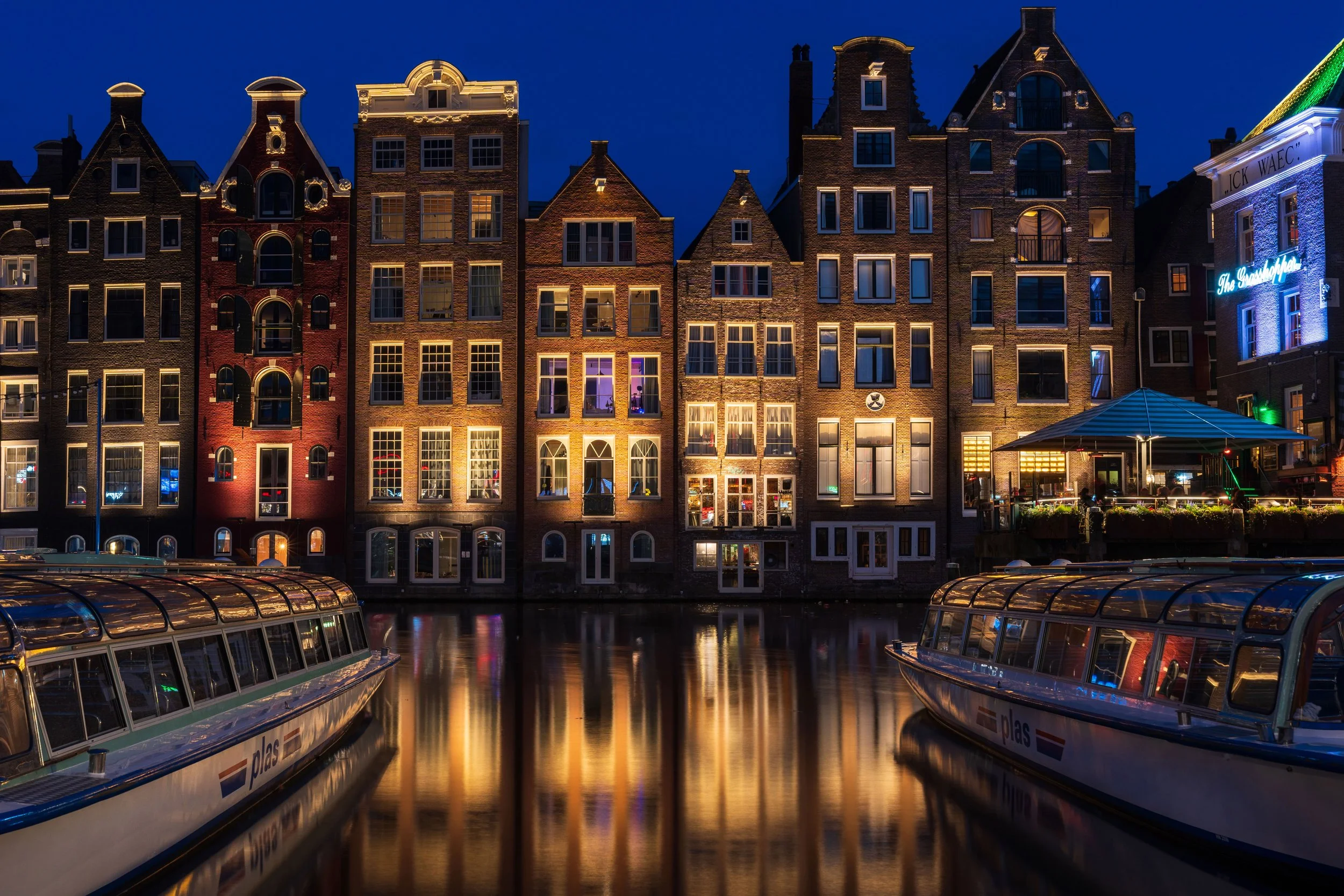 The Damrak is an avenue and partially filled in canal at the centre of Amsterdam, Netherlands