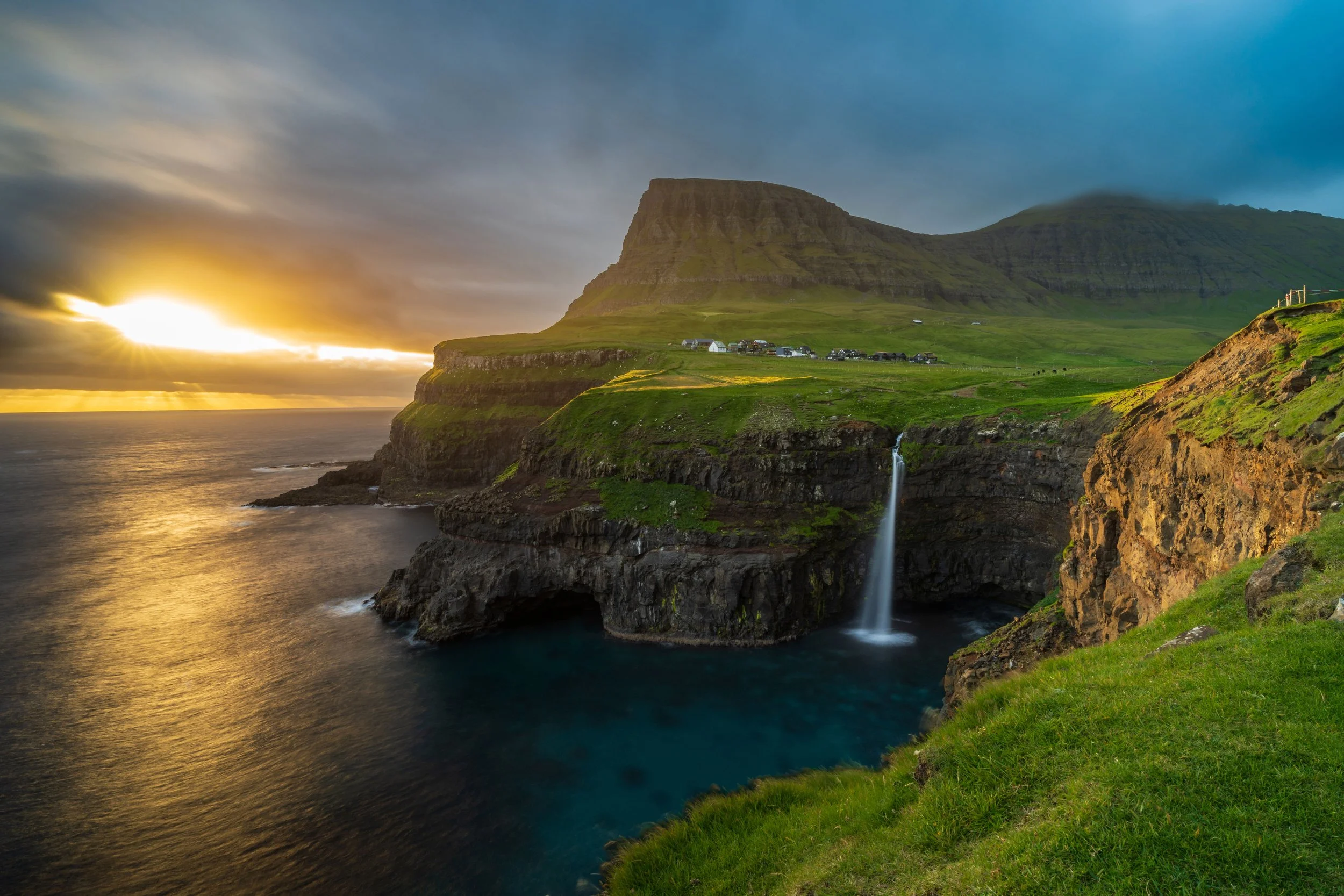 Faroe Islands, View on Mullafossur and Gasadalur village
