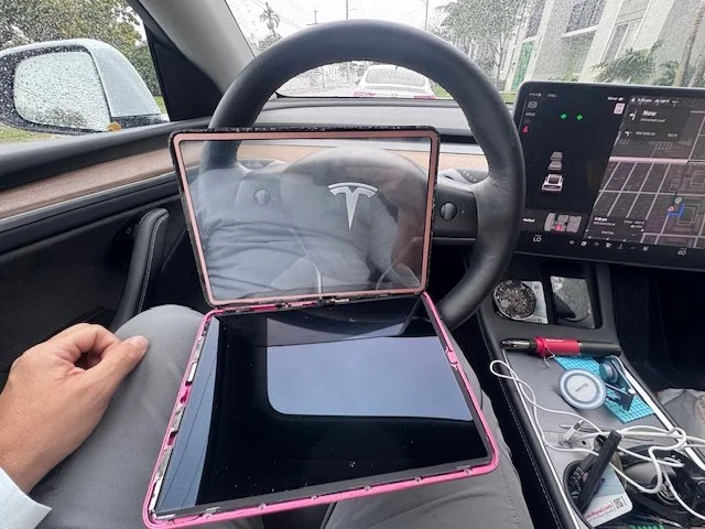 On-site mobile phone repair setup inside Tesla car in Miami