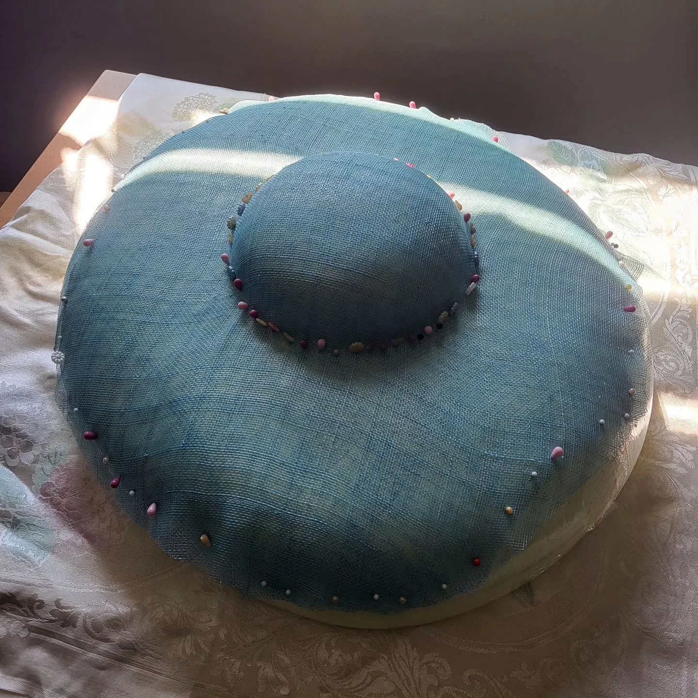 Blocking on a sunny day sure does make the process feel so much more relaxing. This is the base for my clients Ascot piece ~  once off the base, the trimming, steam shaping and wiring can begin. After that, details, which are made in unison with the 