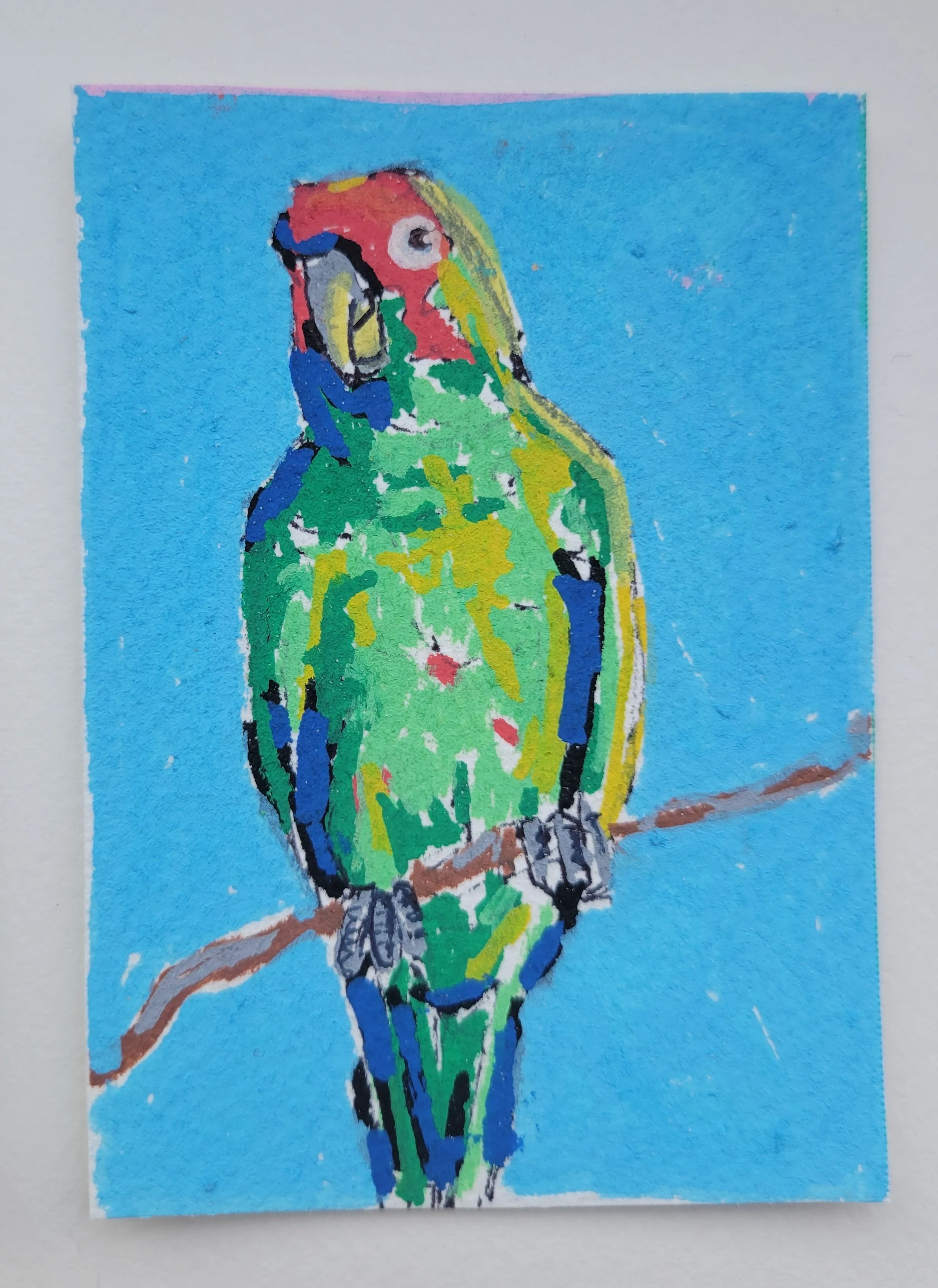 Colorful painting of a parrot perched on a branch against a bright blue background.