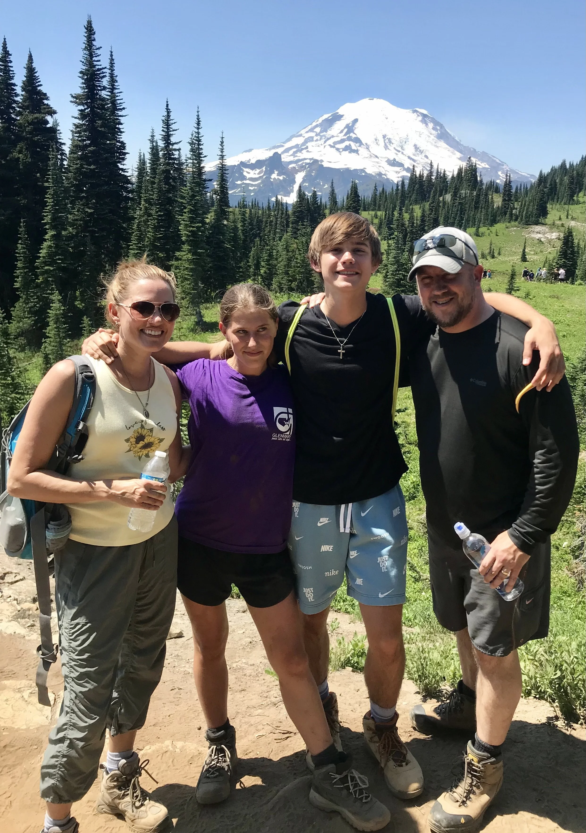 Author Julie Yost and her family, hiking.