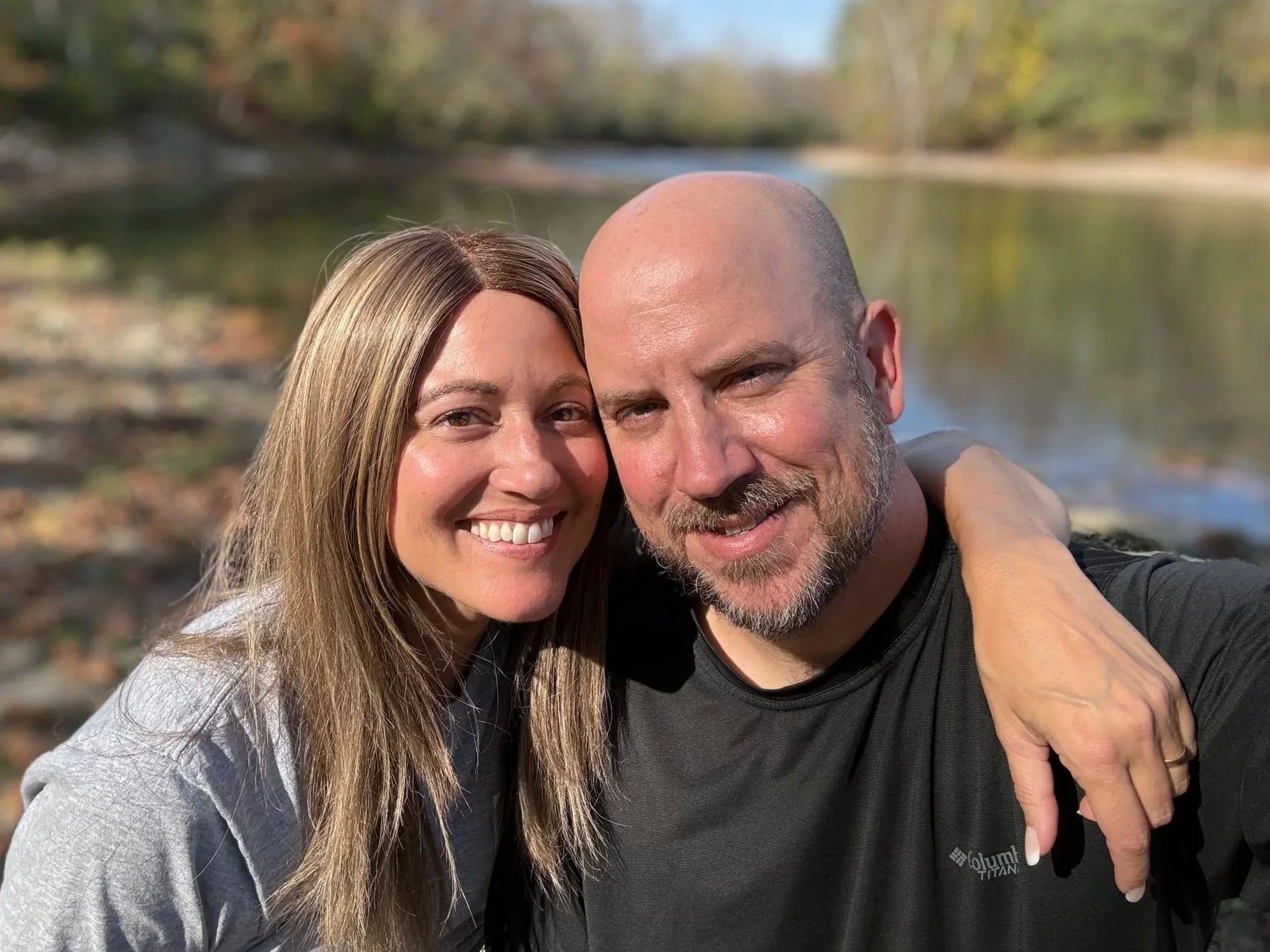 Author Julie Yost and her husband Dave posing outdoors
