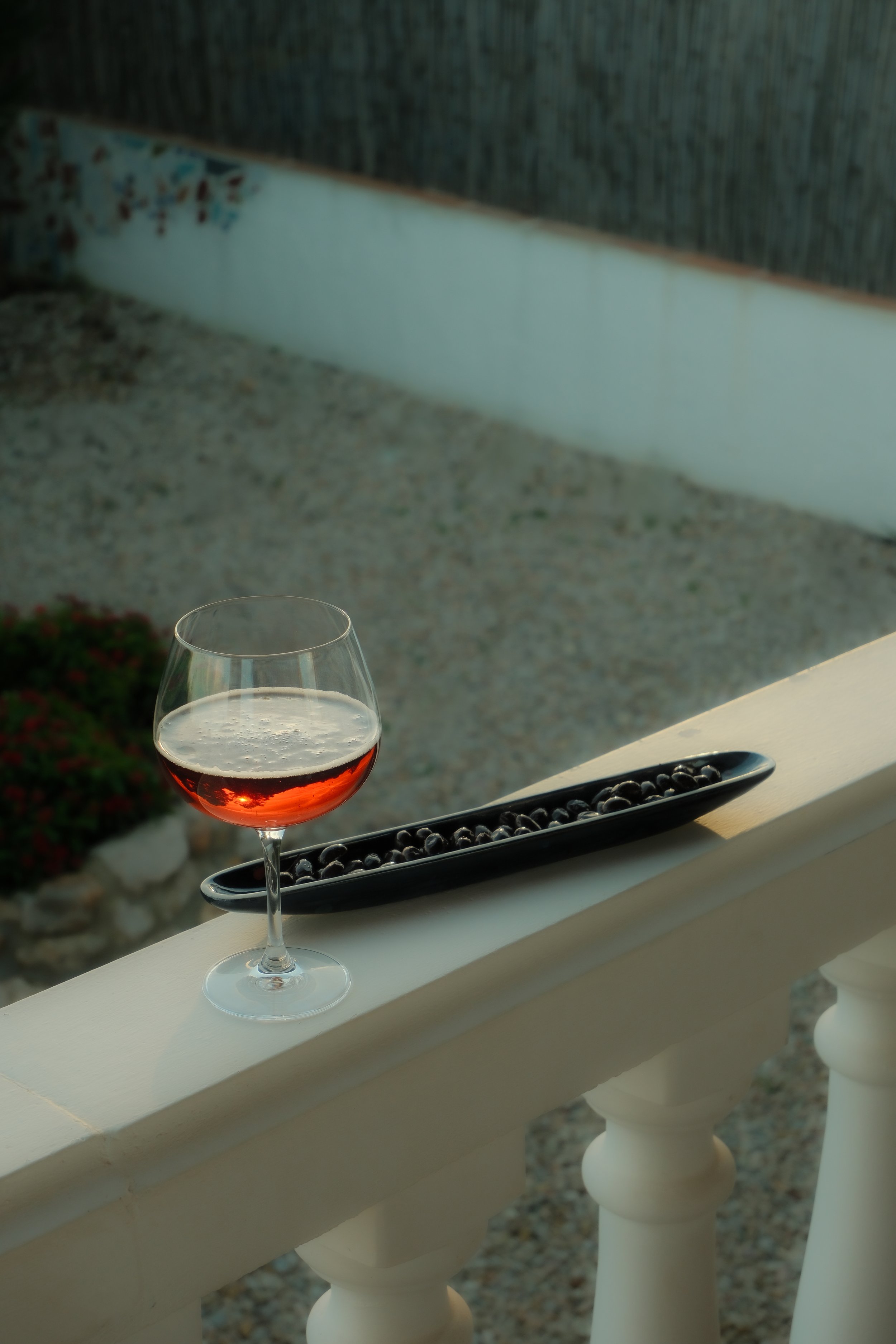 Glass of beer on a terrace in the sun