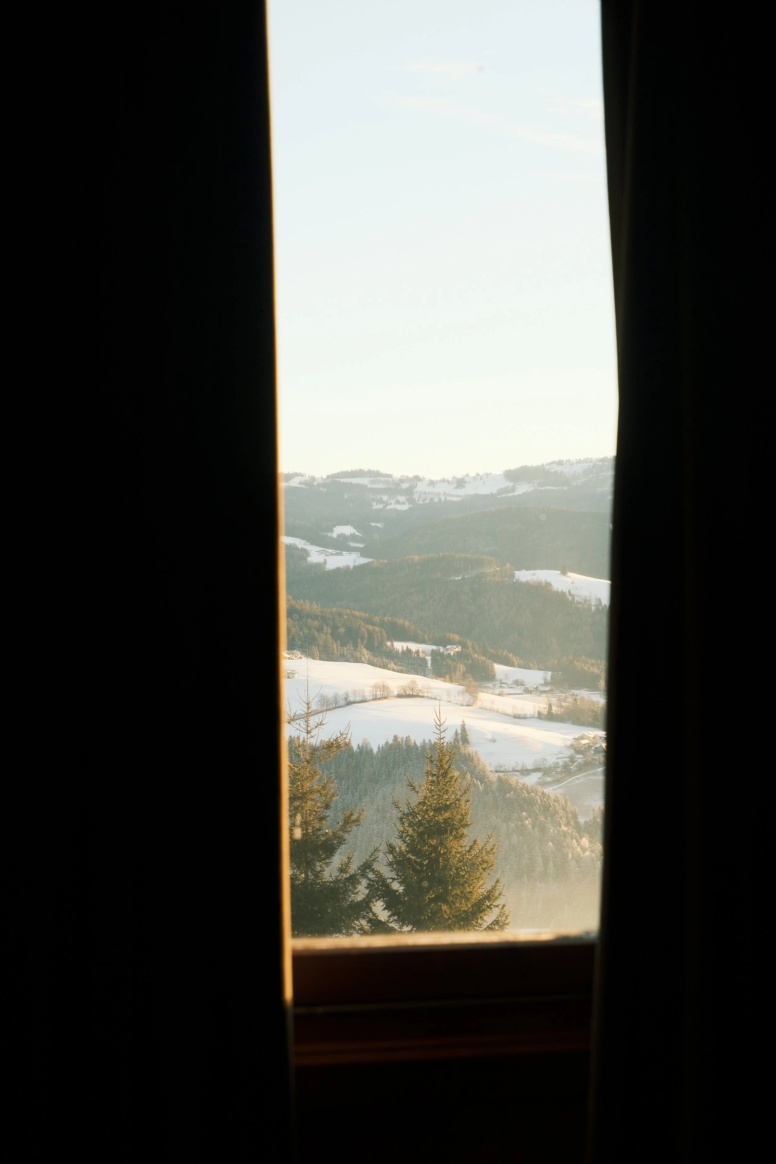 Mountain view through a window in Austria