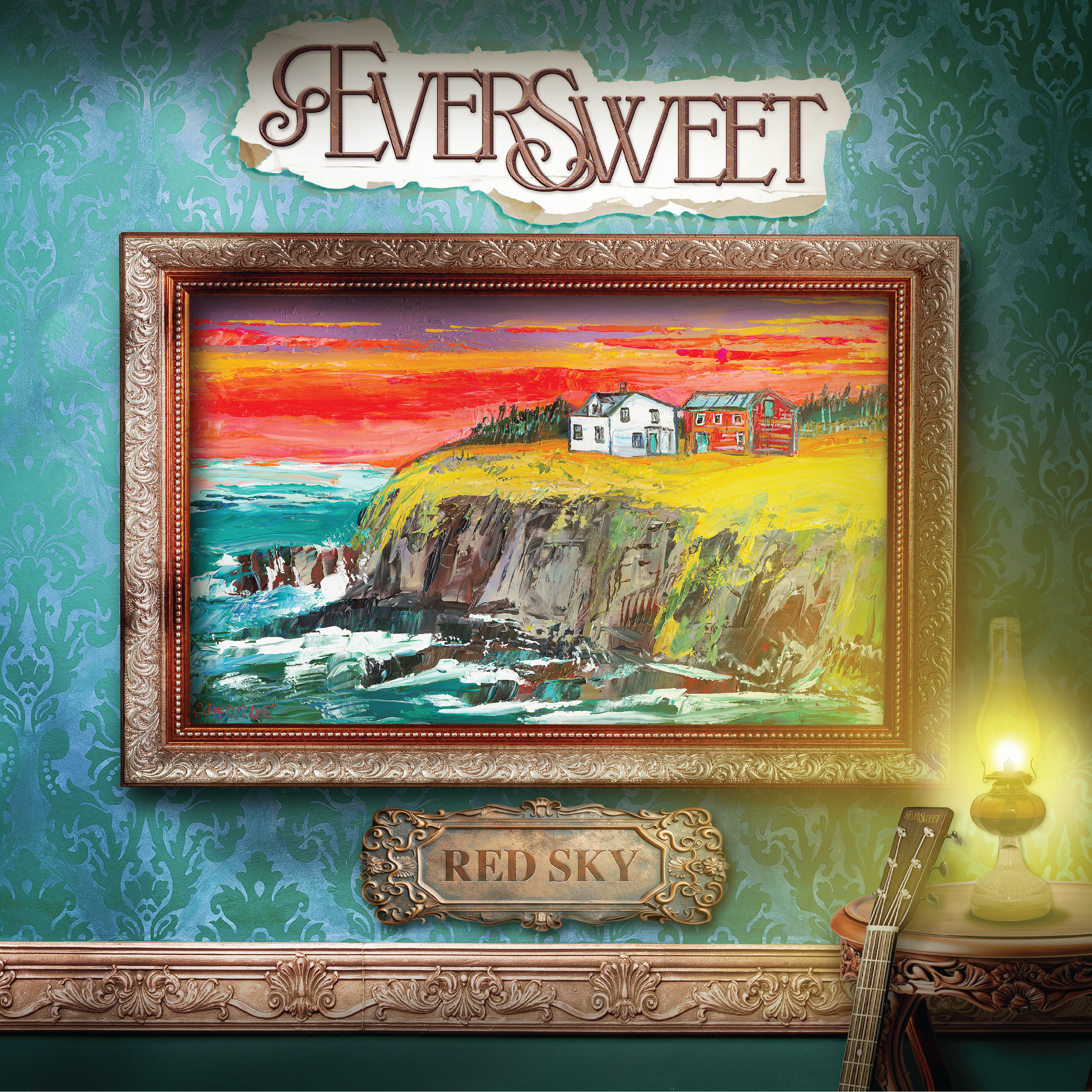 A framed painting of a coastal scene with cliffs, ocean waves, and houses under a colorful sky, hanging on a green patterned wall. Above it is a sign that says 'EVERY SWEET'. Below the painting is a metal plaque that says 'RED SKY'. To the right, there is a table with a lit oil lamp and an acoustic guitar leaning against it.