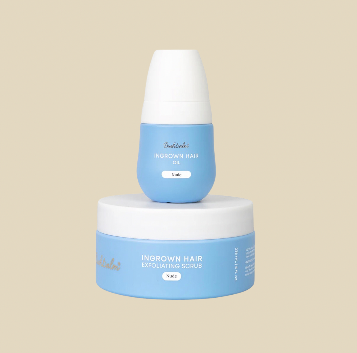 Bushbalm ingrown hair products, including exfoliating scrub and hair oil, with white caps and labels reading. Products for waxing aftercare sold at Sugar Cookie Waxing Co. Toronto