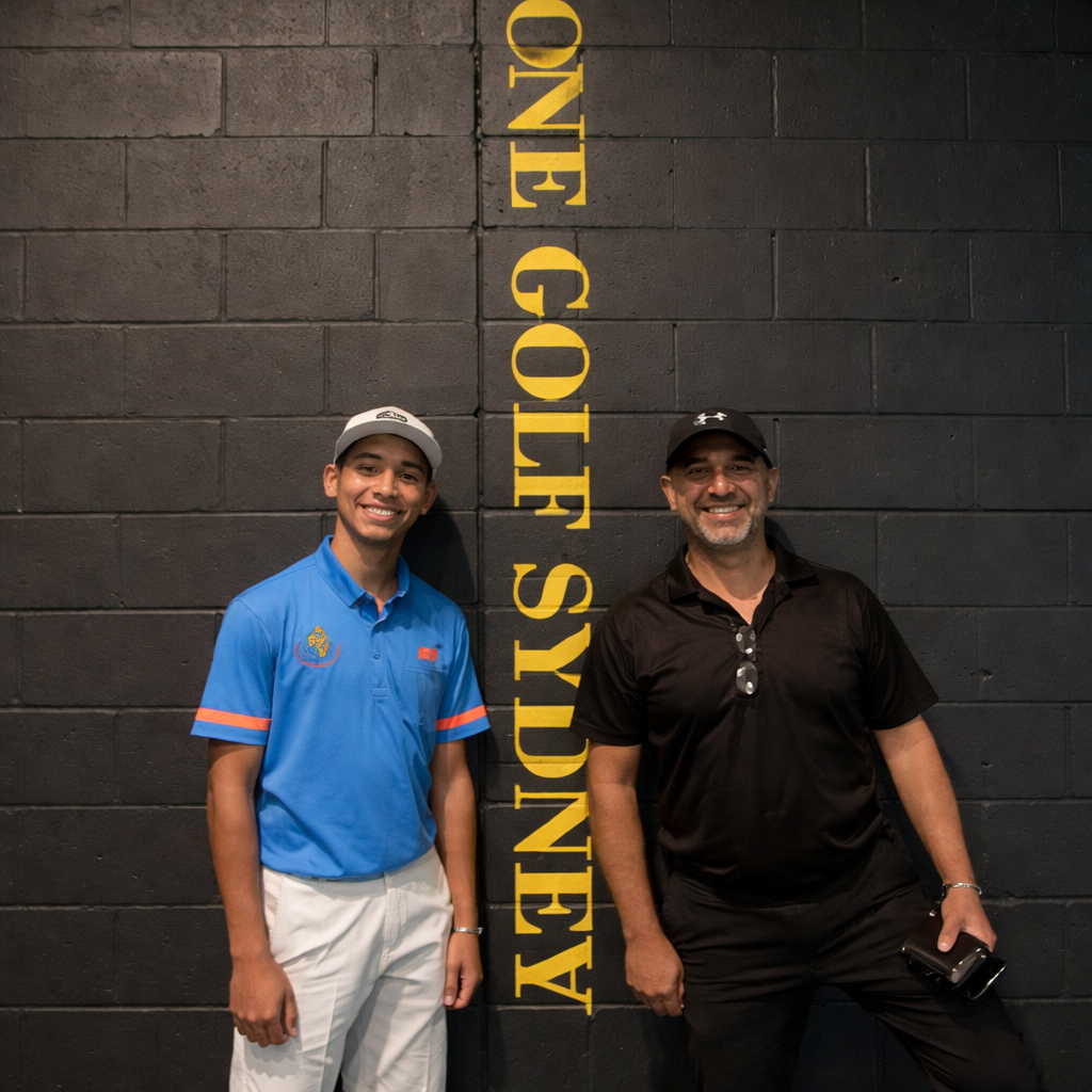 Junior golf coaching session