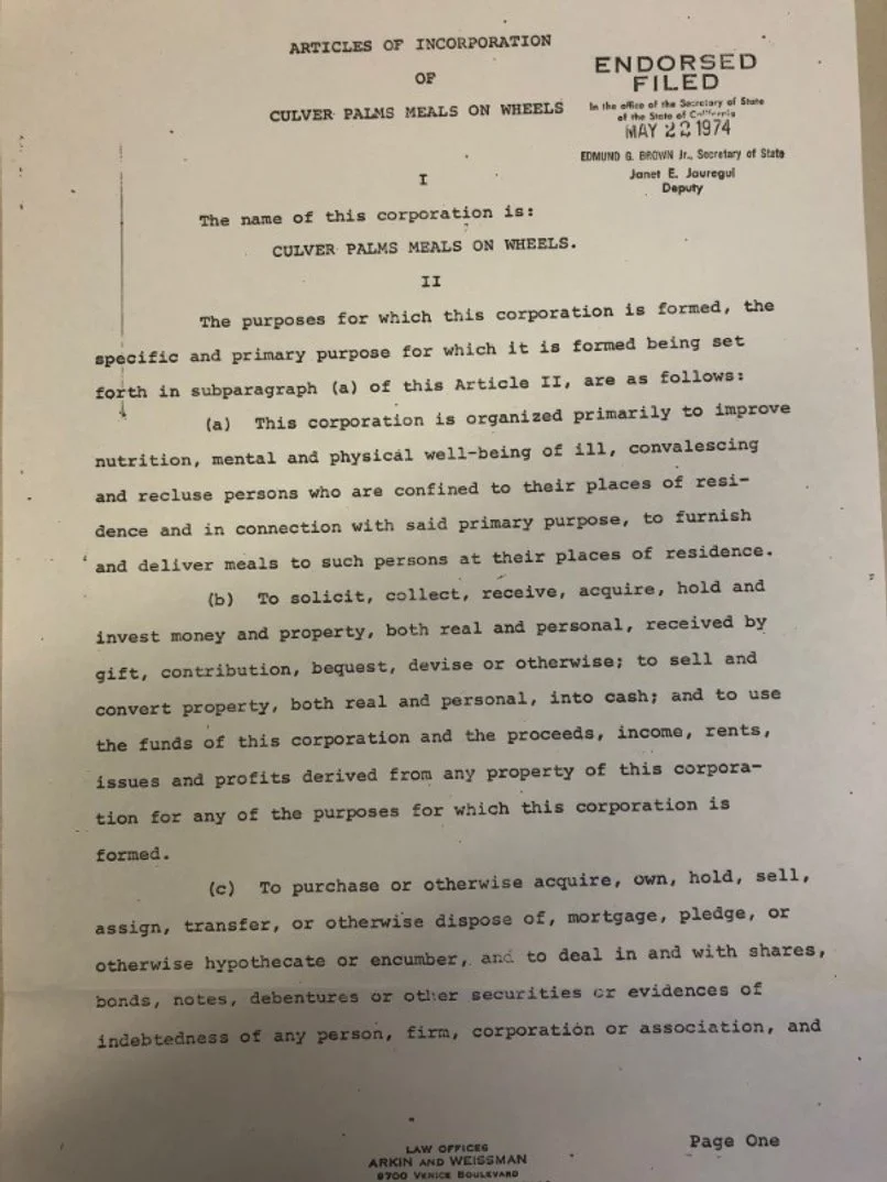 A legal document titled 'Articles of Incorporation' for 'Culver Palms Meals on Wheels,' endorsed filed on May 22, 1974, with sections outlining the corporation's purpose and activities, stamped 'Endorsed Filed' and signed by officials.